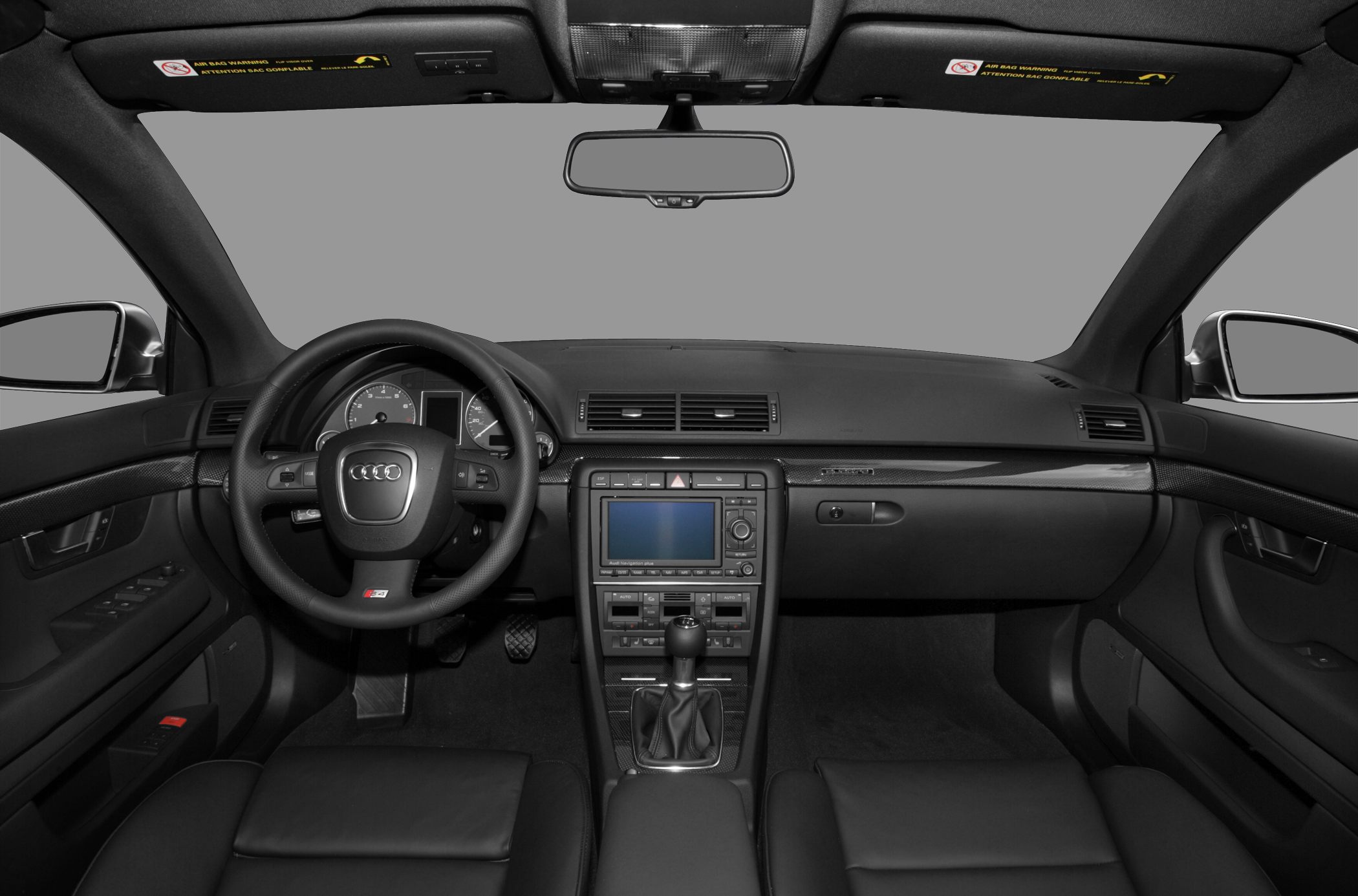 Dashboard, steering wheel, and center console of a car interior