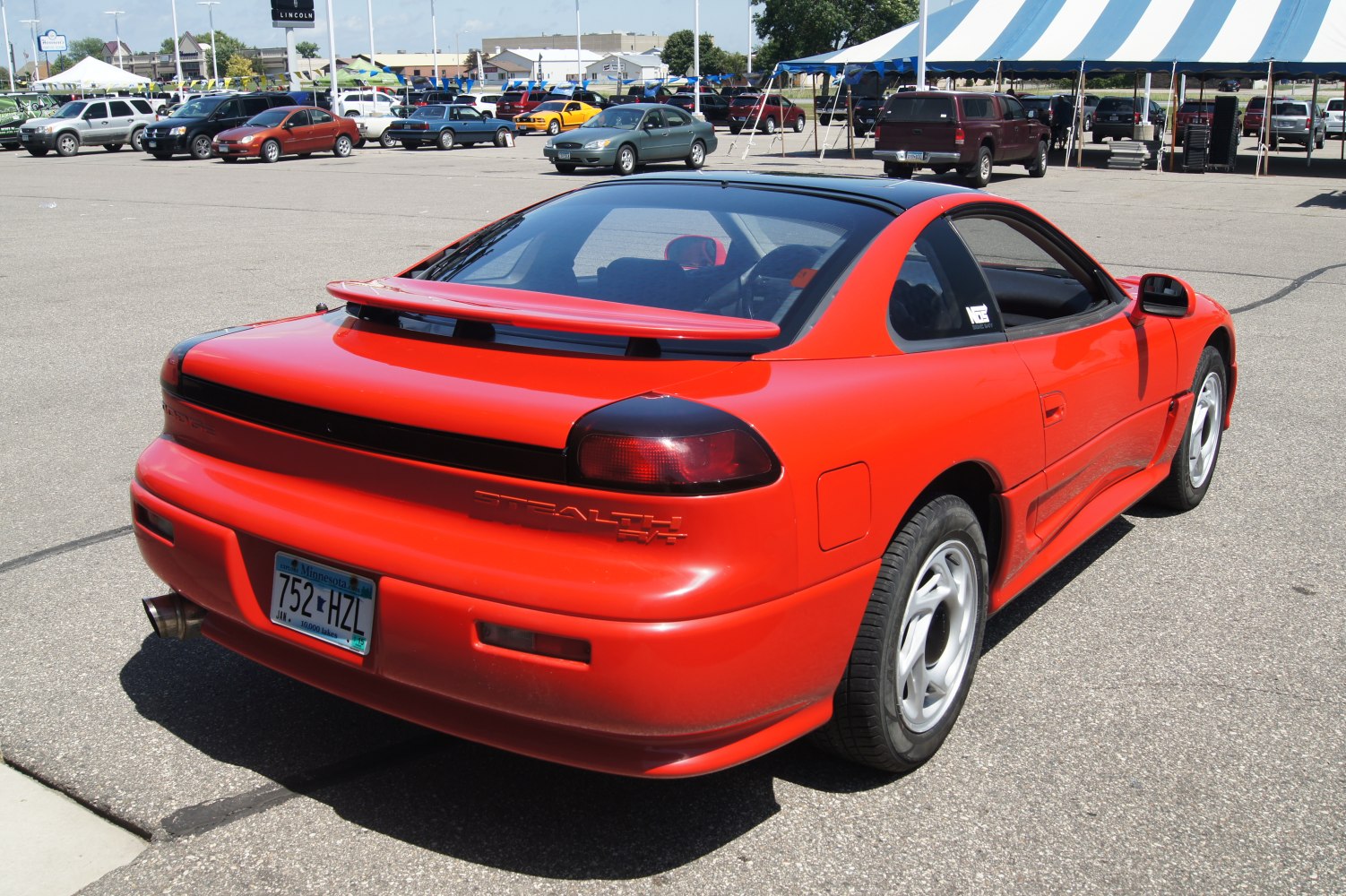 Rear view of sports coupe with spoiler and tail lights