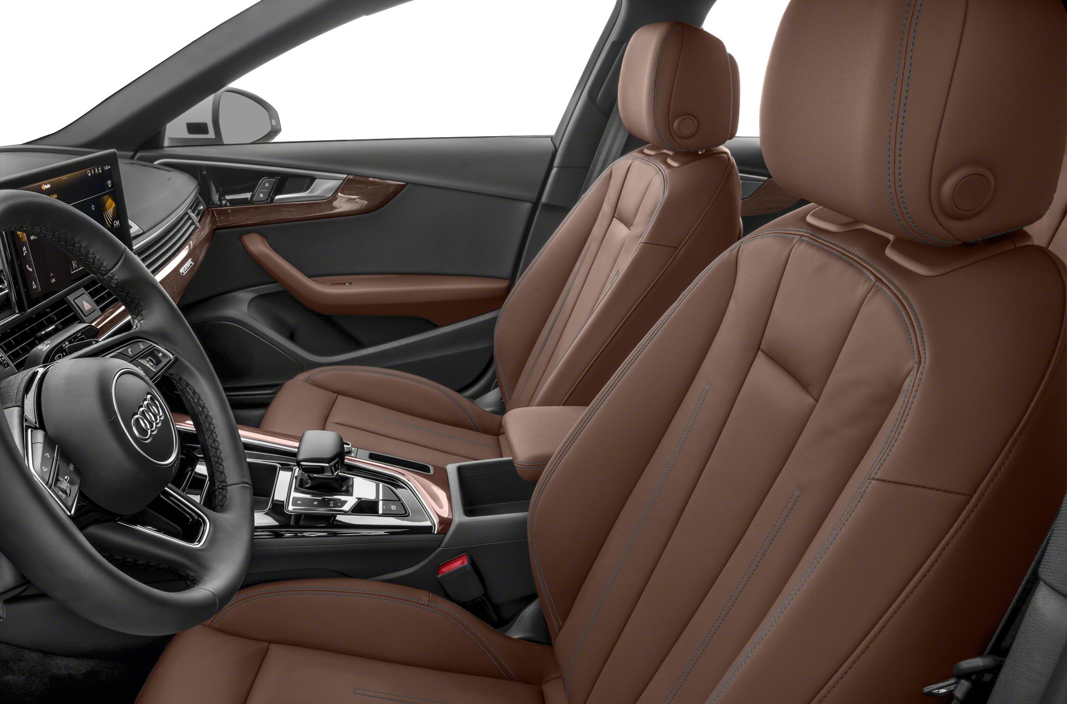 Brown leather seats and modern dashboard with steering wheel and gear shift