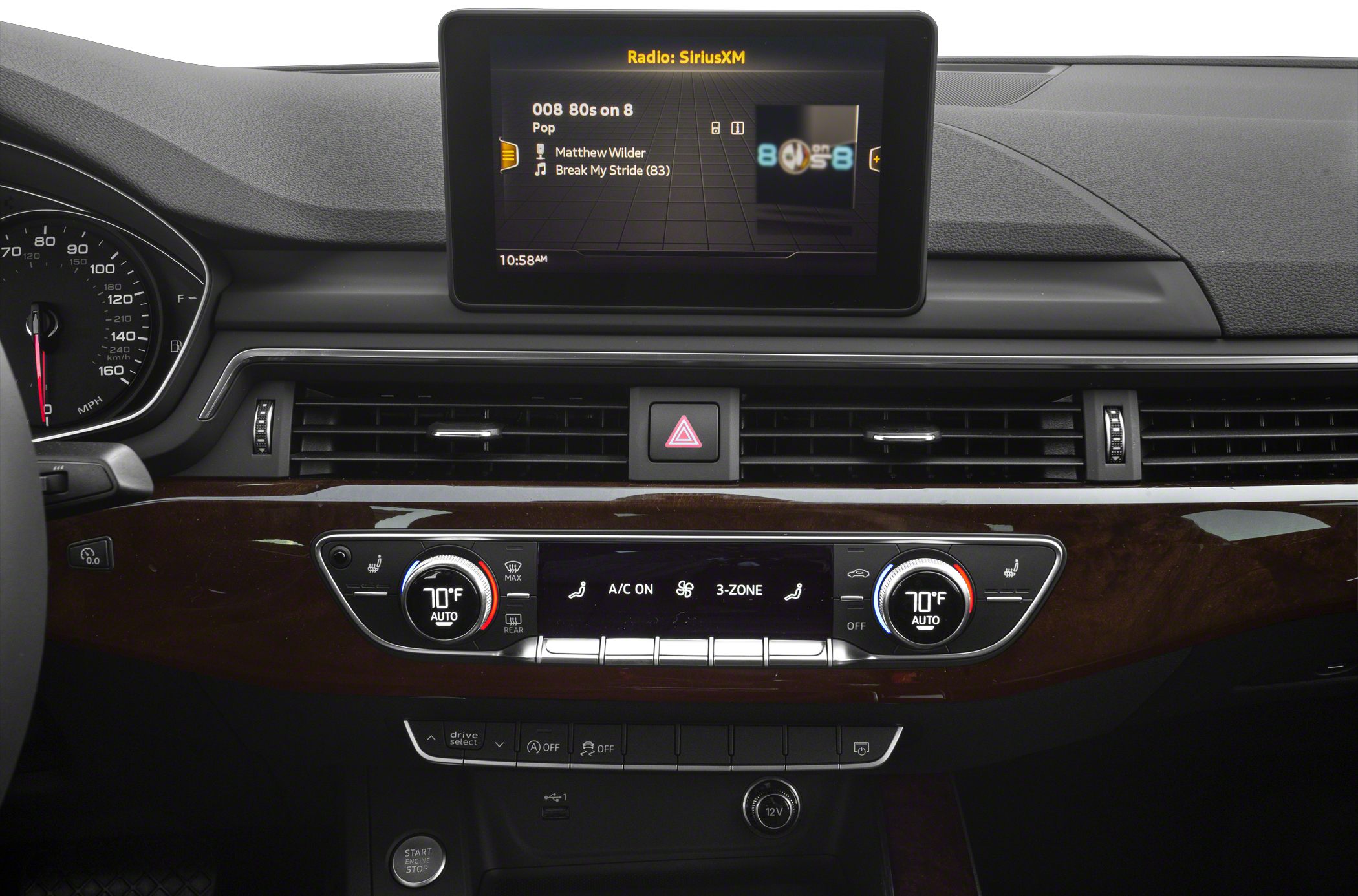 Audi A4 dashboard showing infotainment screen and climate control system