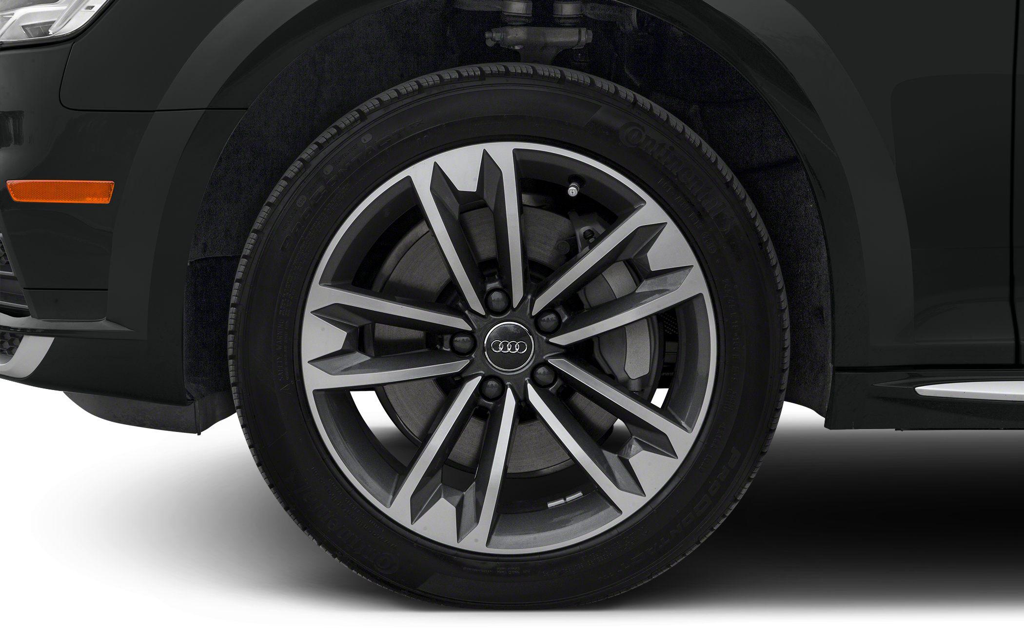Close-up of intricate alloy wheel with Continental tire