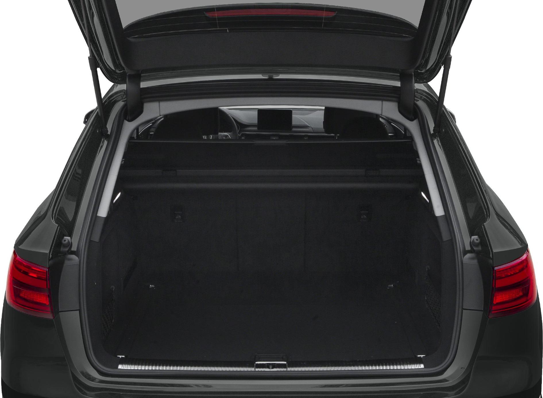 Spacious open trunk with view of car interior and rear seats