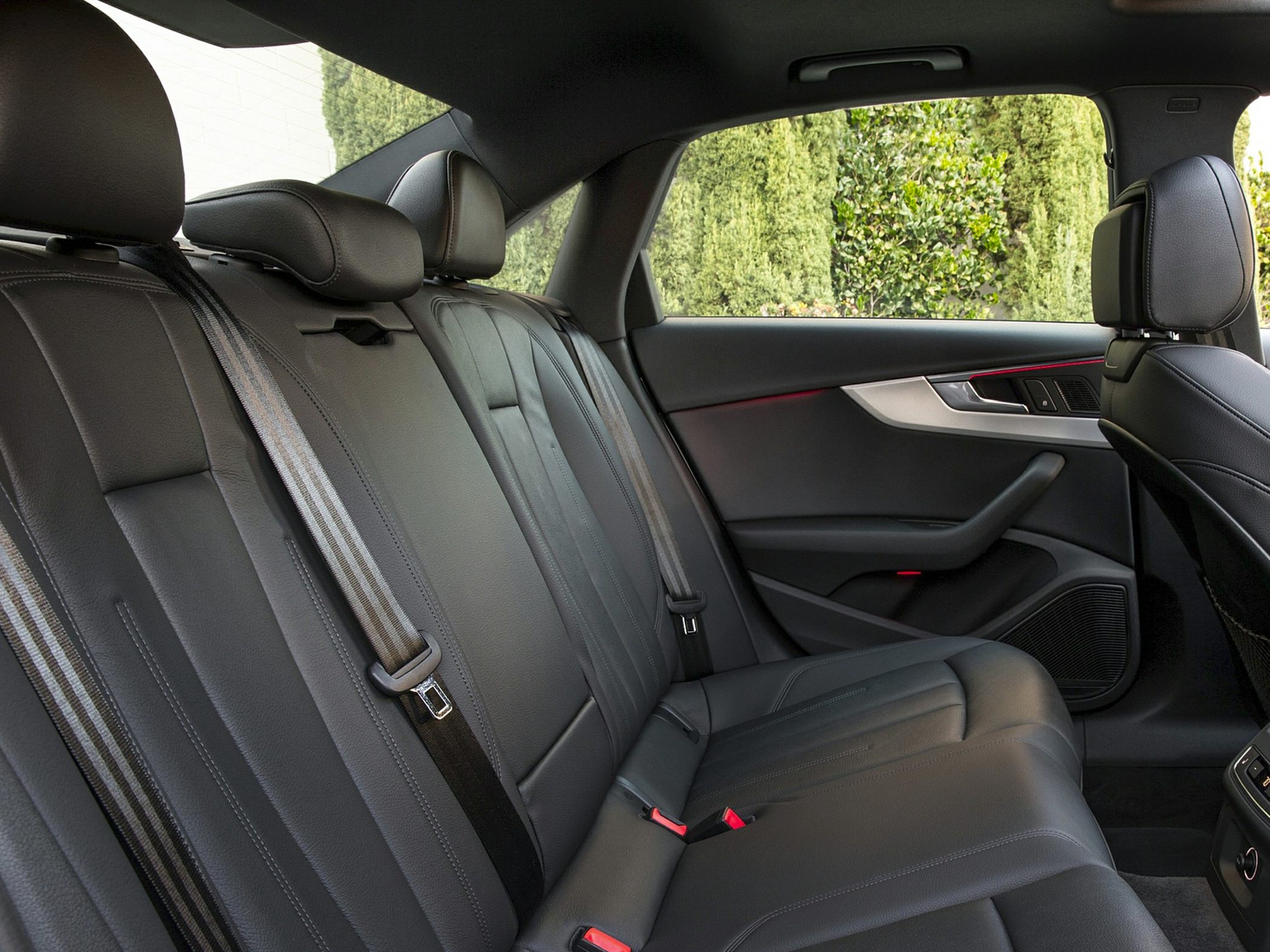 Rear leather seats with headrests and seat belts