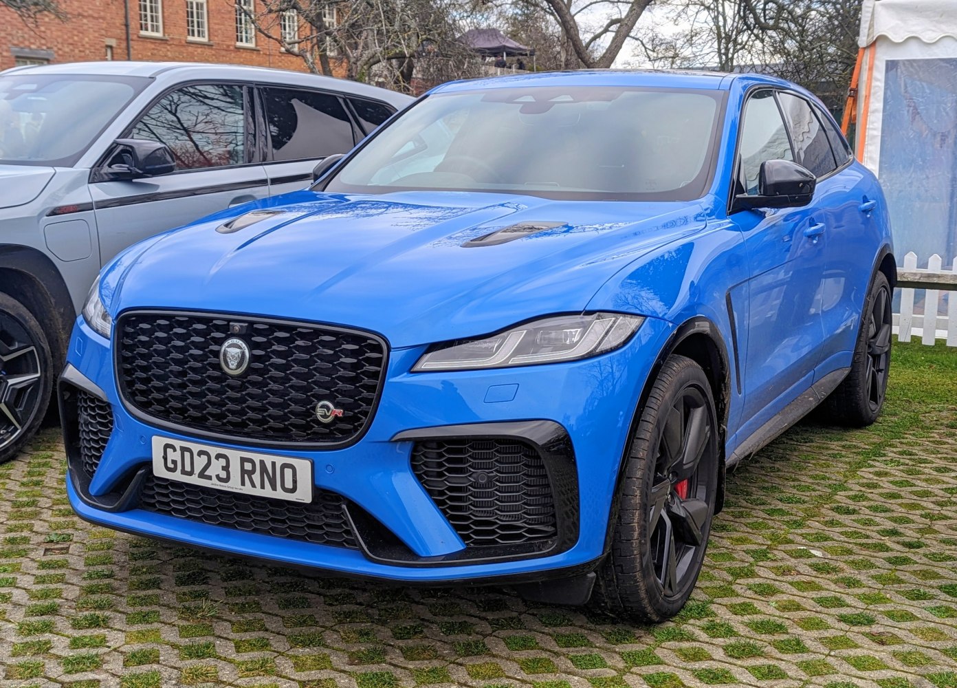 Blue SUV with sporty honeycomb grille and sleek LED headlights