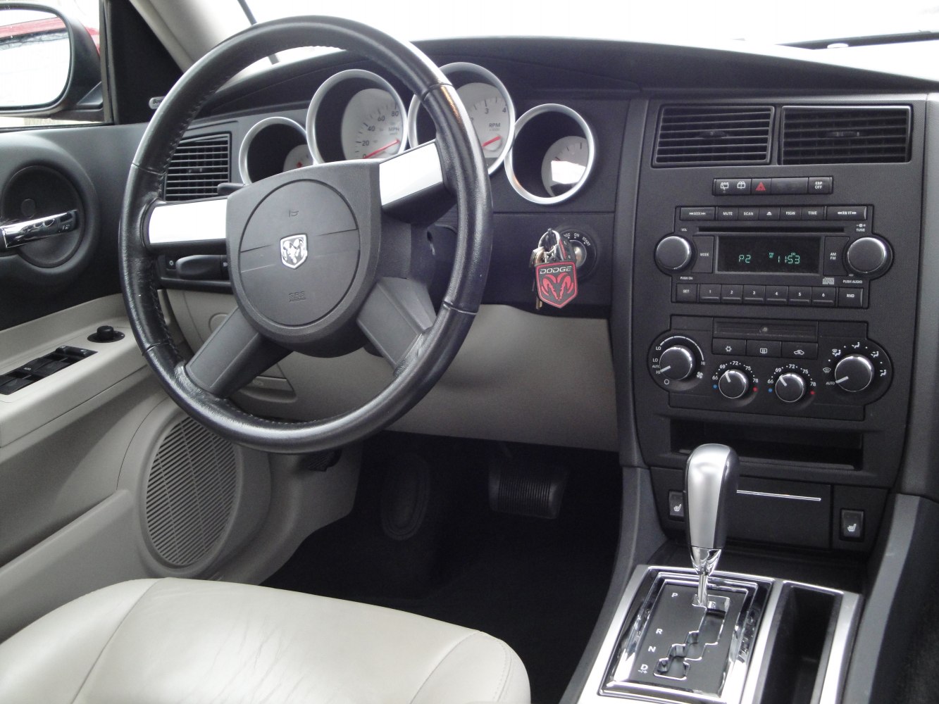Steering wheel, dashboard, and automatic gear shift lever in vehicle interior