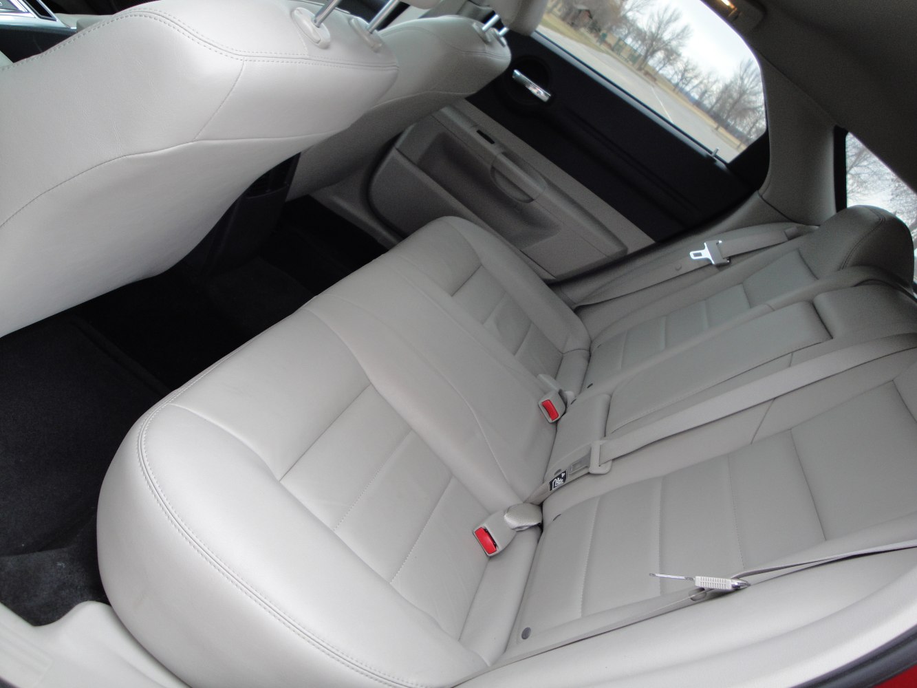 Leather rear seats with seat belts and spacious backseat area