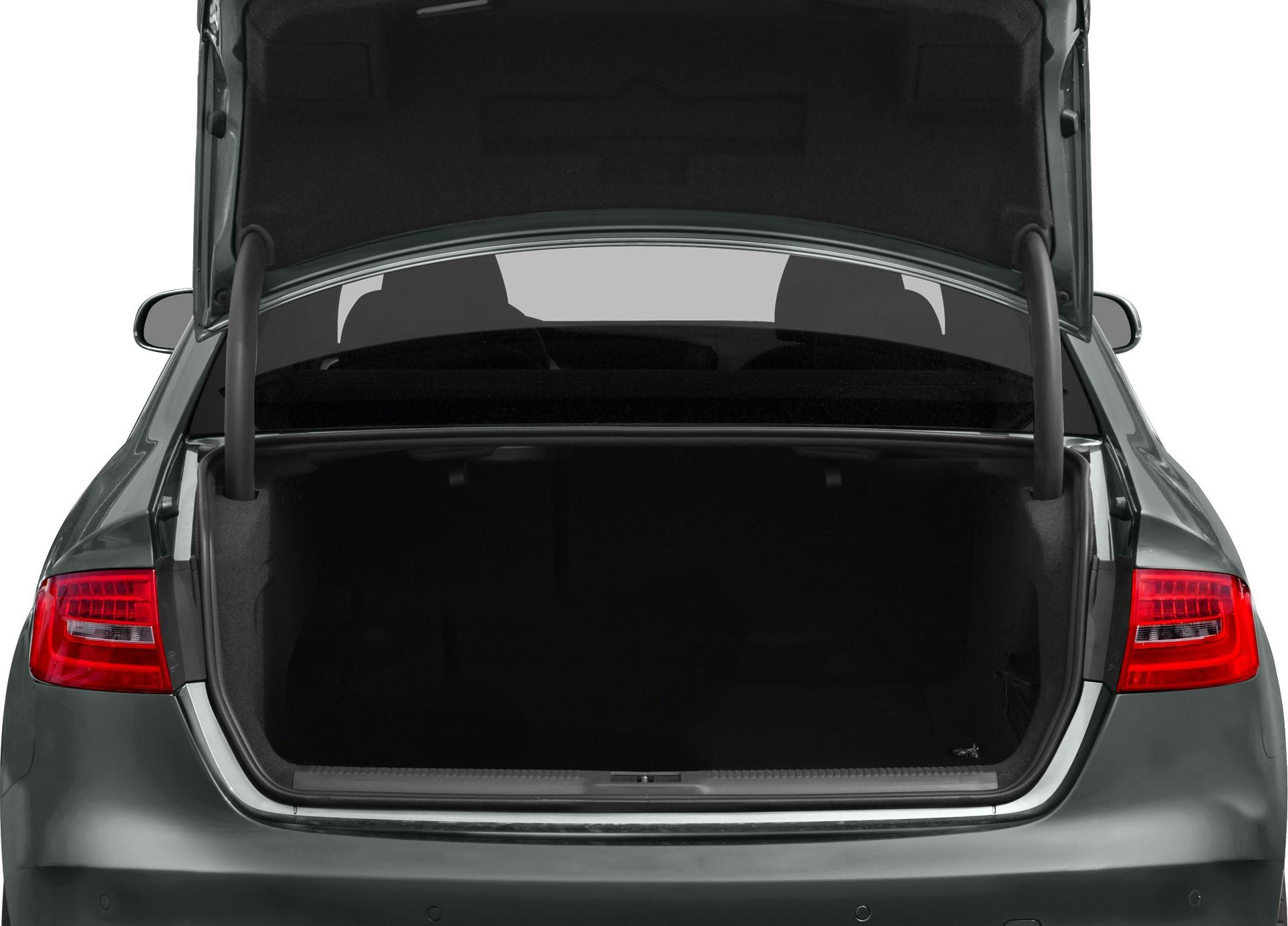 Open trunk of mid-size sedan with visible rear lights