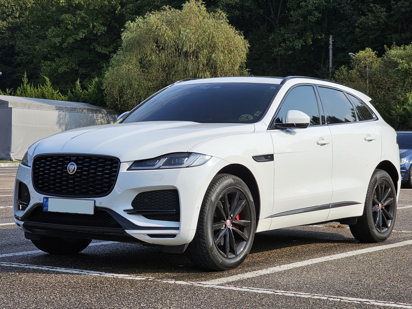 SUV with modern front grille and black alloy wheels