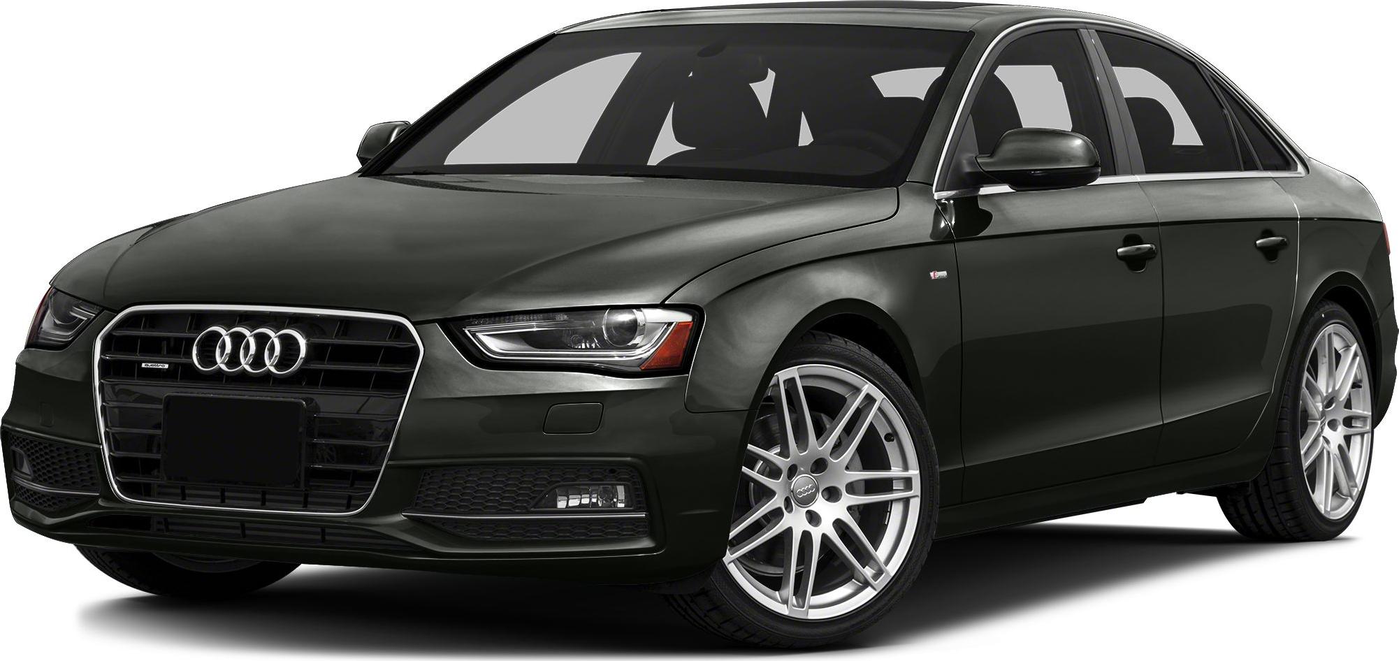 Front side view of a sleek sedan with distinctive headlights and alloy wheels