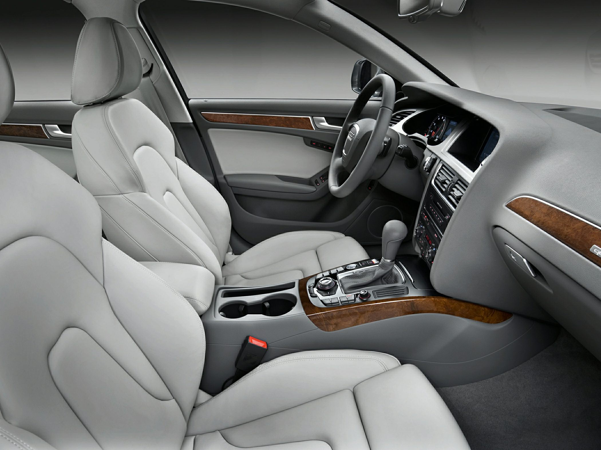 Leather seats with wood trim and modern dashboard controls