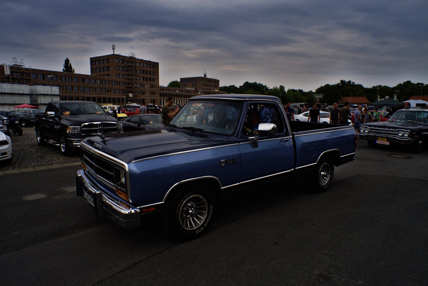 Mid-size conventional cab pickup with chrome trim and square grille
