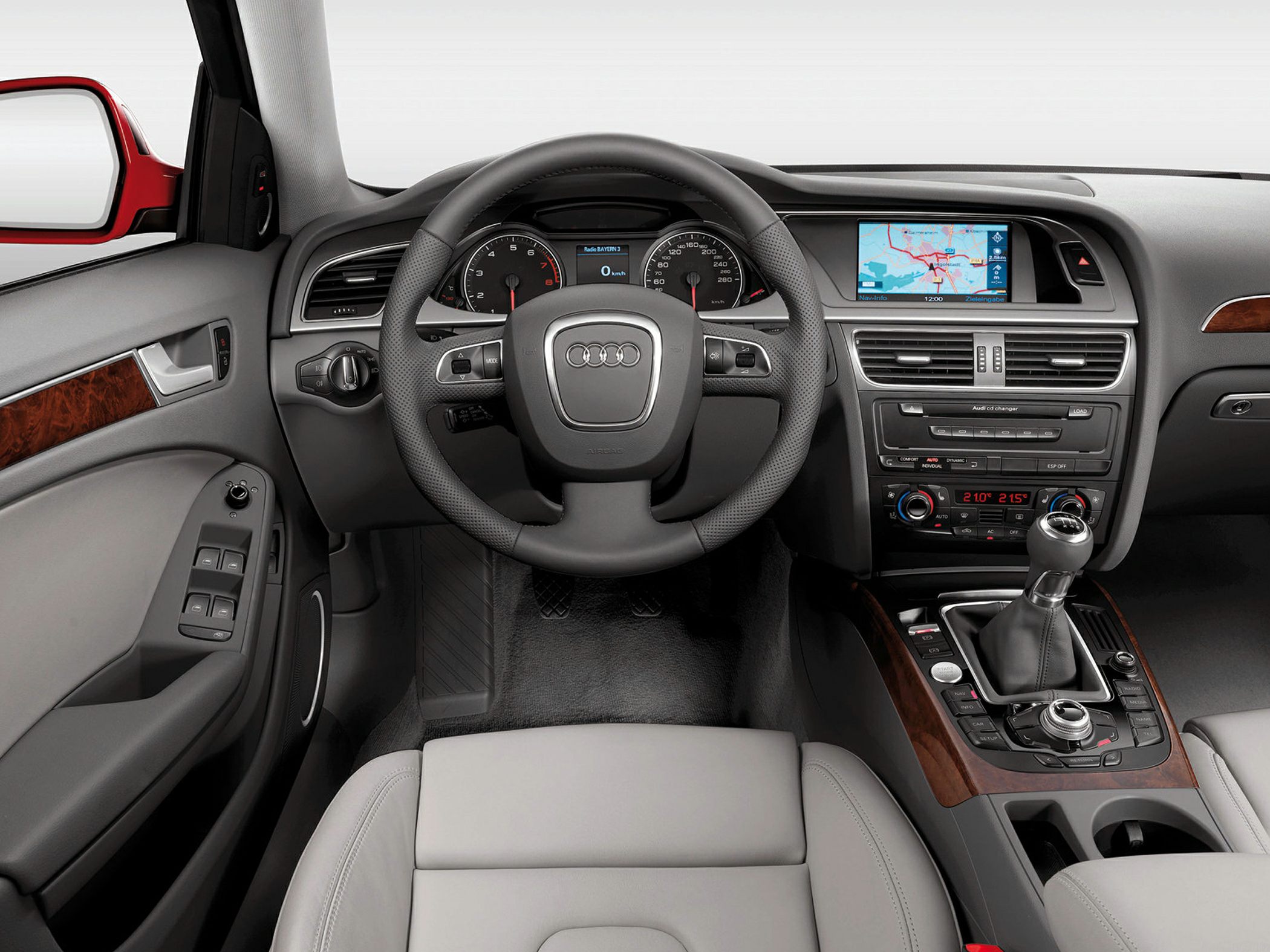 Steering wheel, manual gearshift, navigation display, climate control console