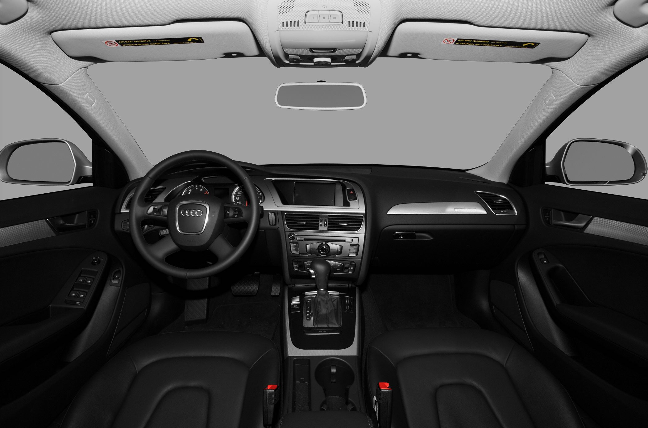 Dashboard, steering wheel, and central console of a car interior