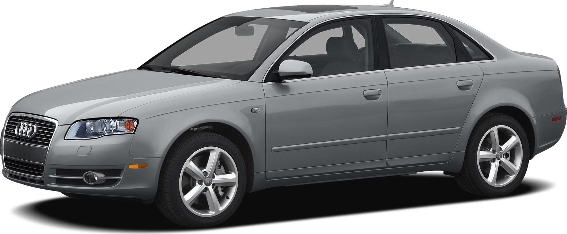Front side view of mid-2000s silver sedan with alloy wheels