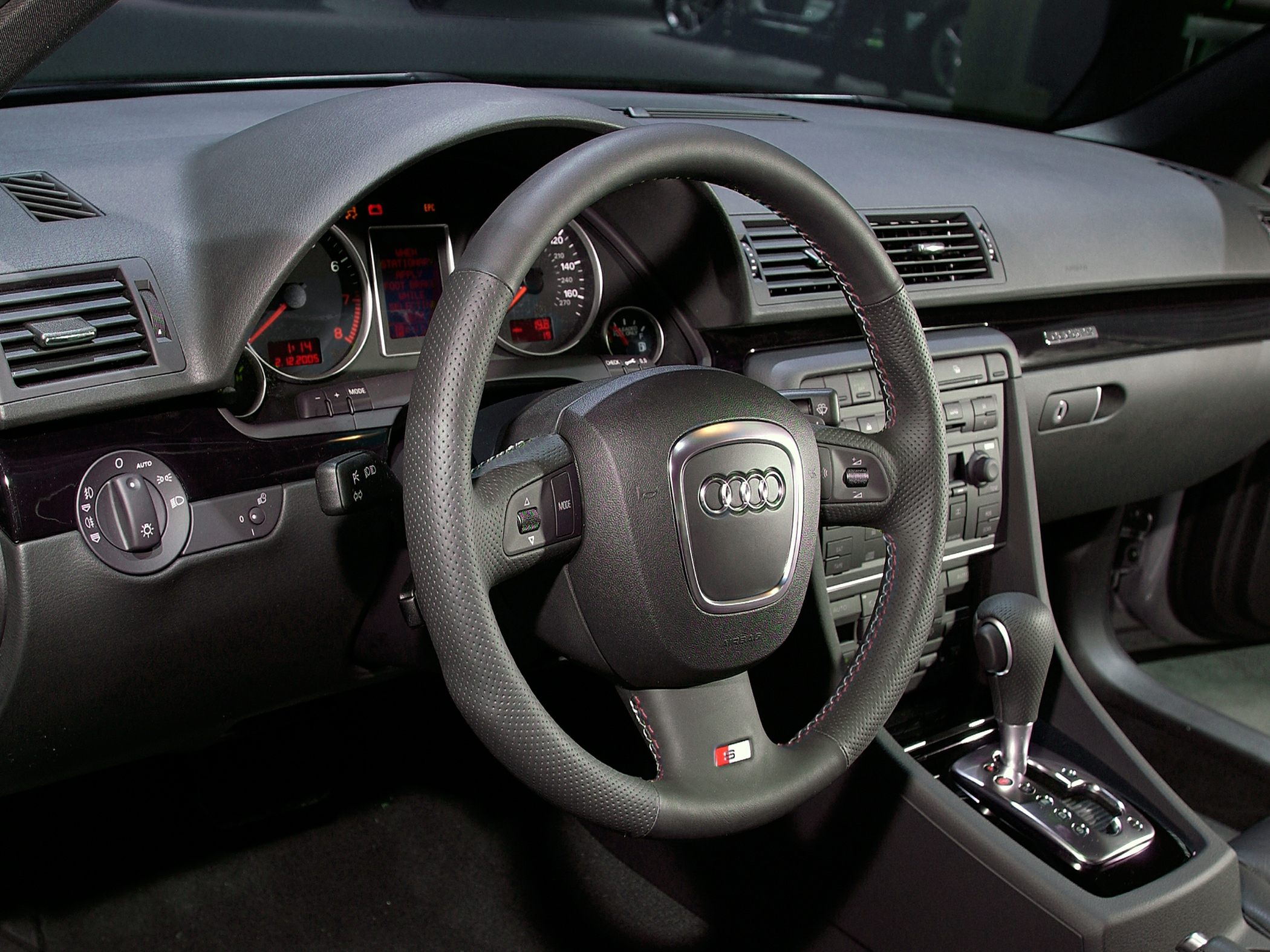 Audi steering wheel, instrument cluster, and center console detailed interior