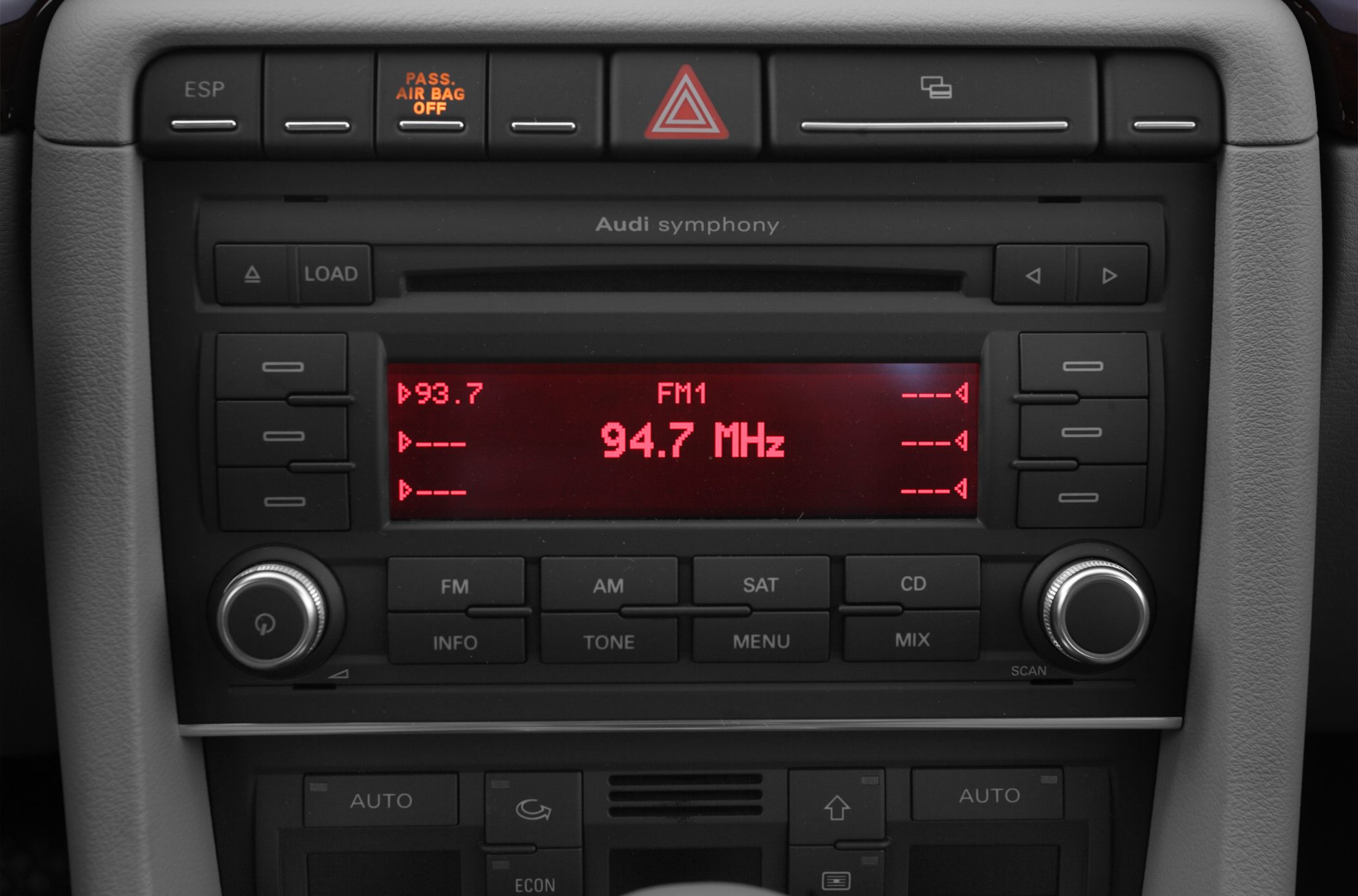Audi Symphony radio unit with FM frequency display and dashboard controls