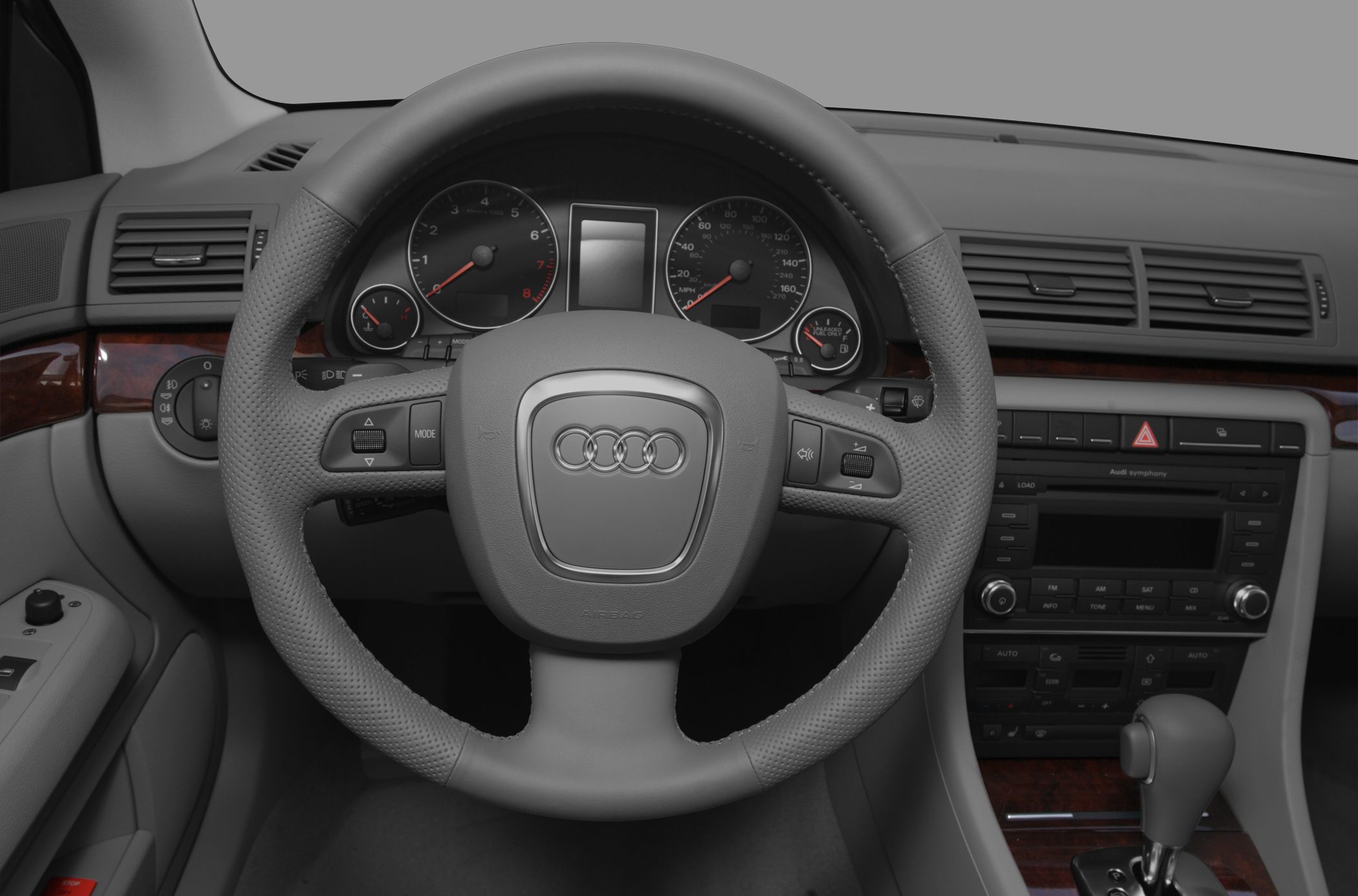 Steering wheel and dashboard with instrument cluster and center console