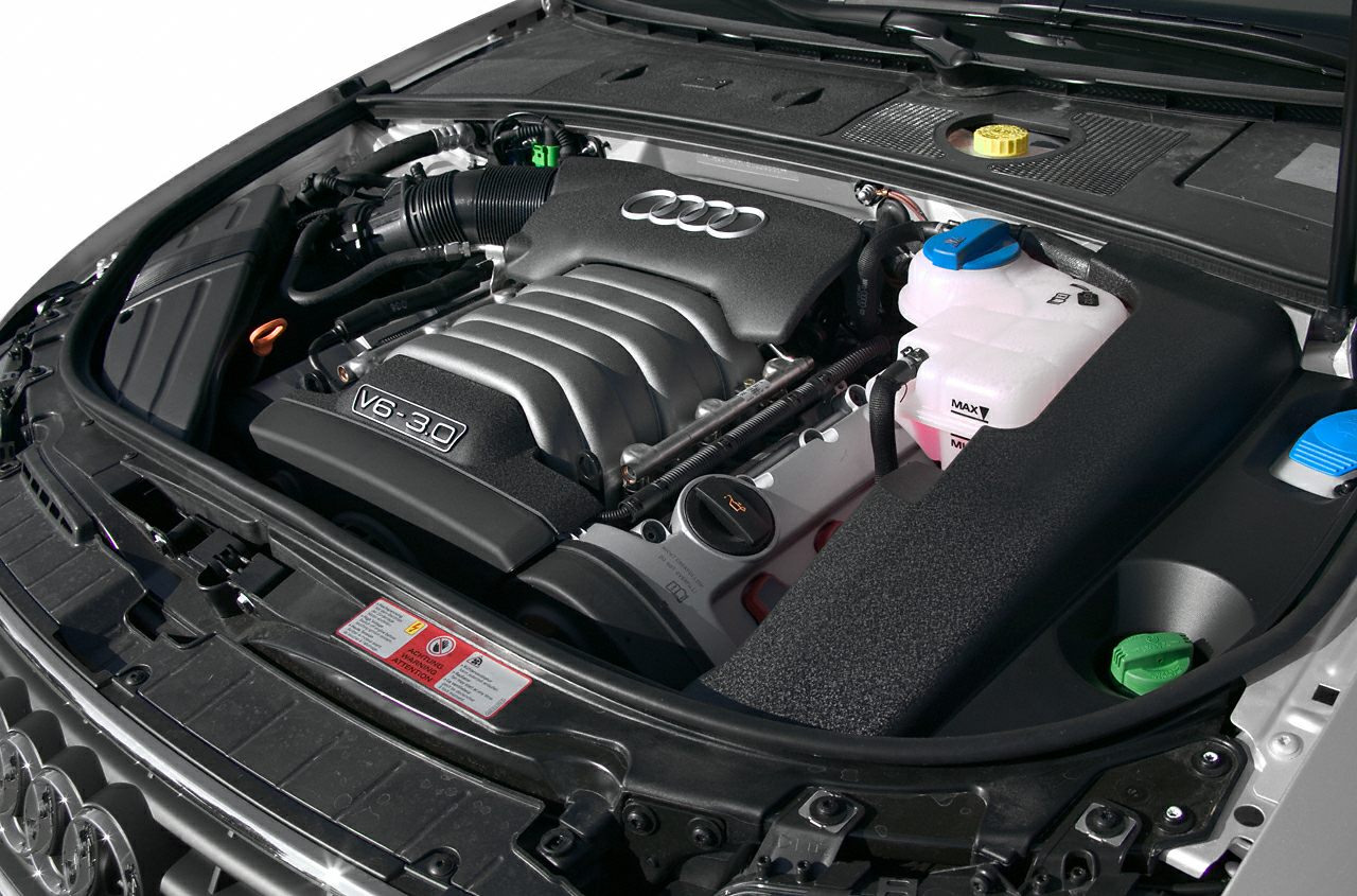 V6 3.0 engine bay with Audi emblem