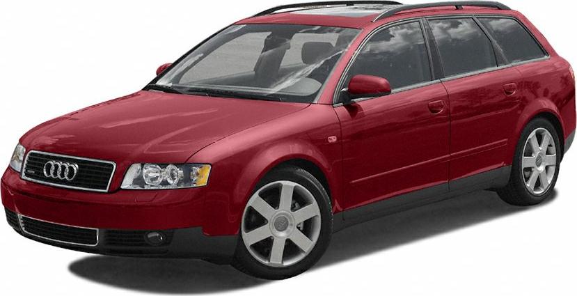 Red station wagon with roof rails and alloy wheels