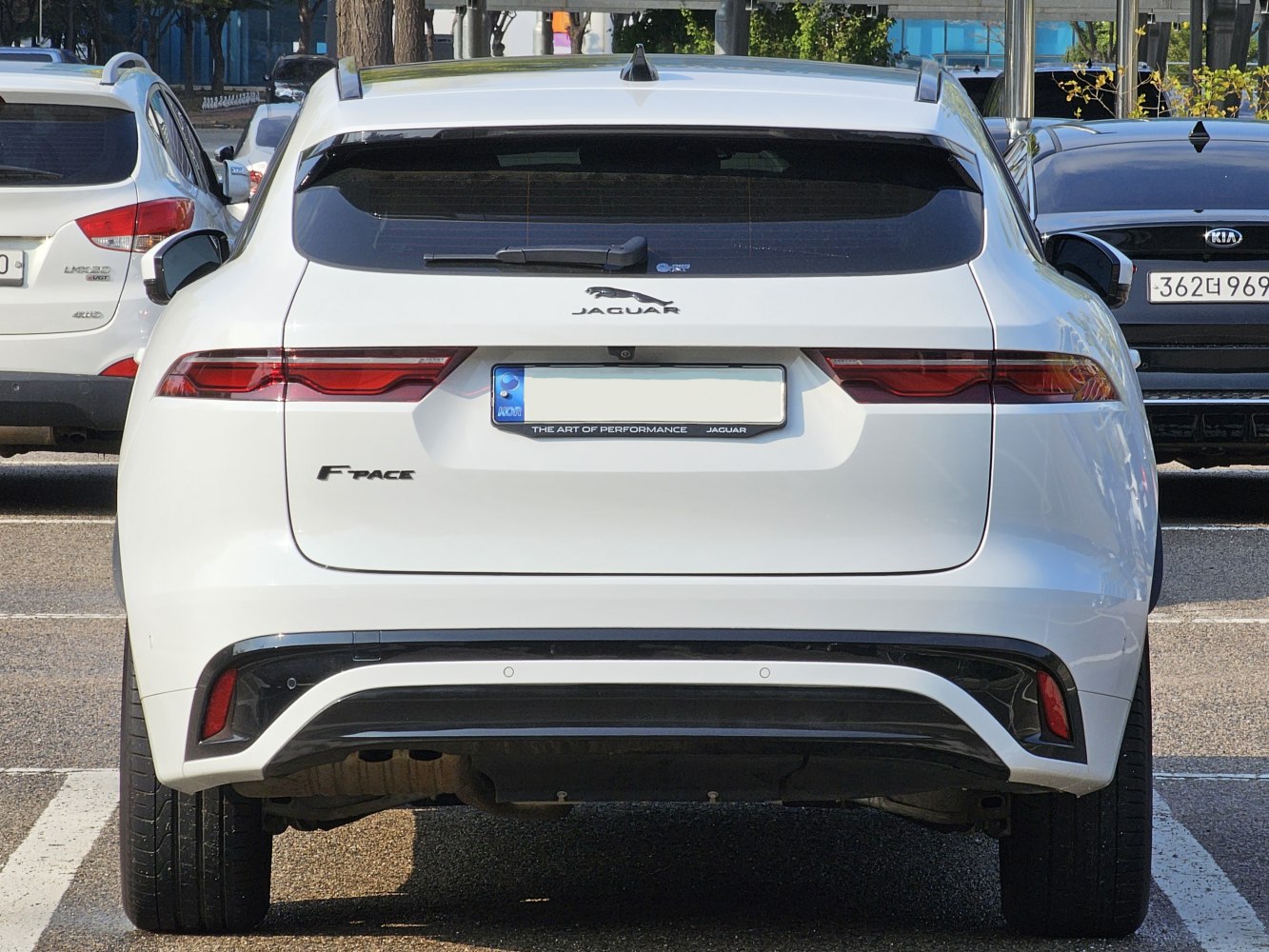 Rear view with updated tail lights and sporty bumper of a modern SUV