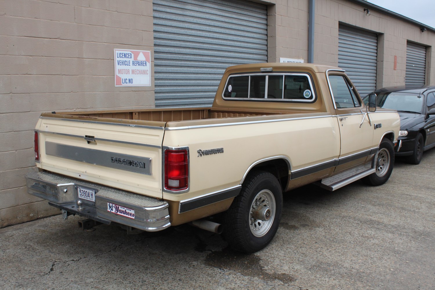 Vintage pickup truck rear with long bed and conventional cab