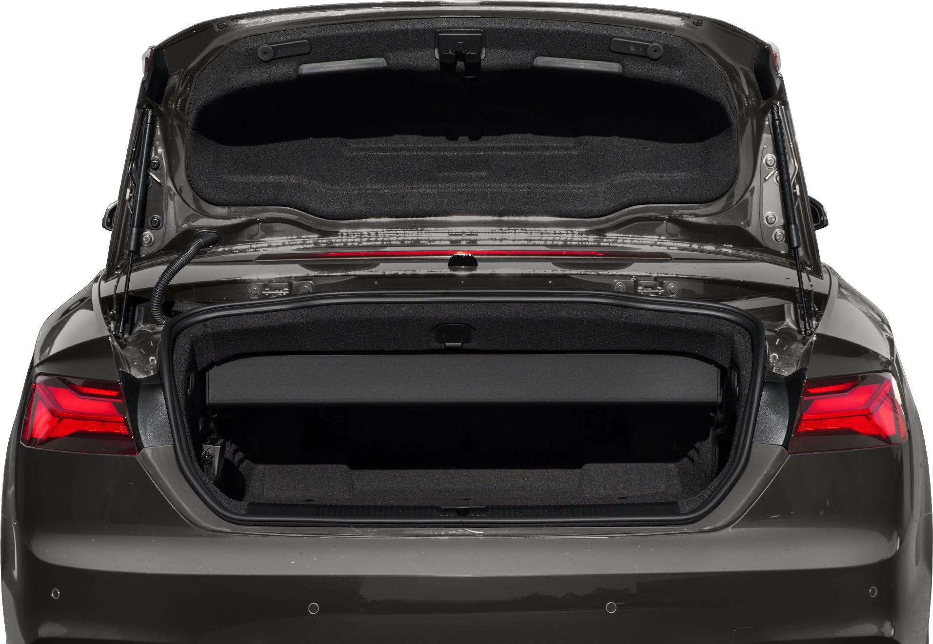 Rear trunk opening showing cargo space and interior lining