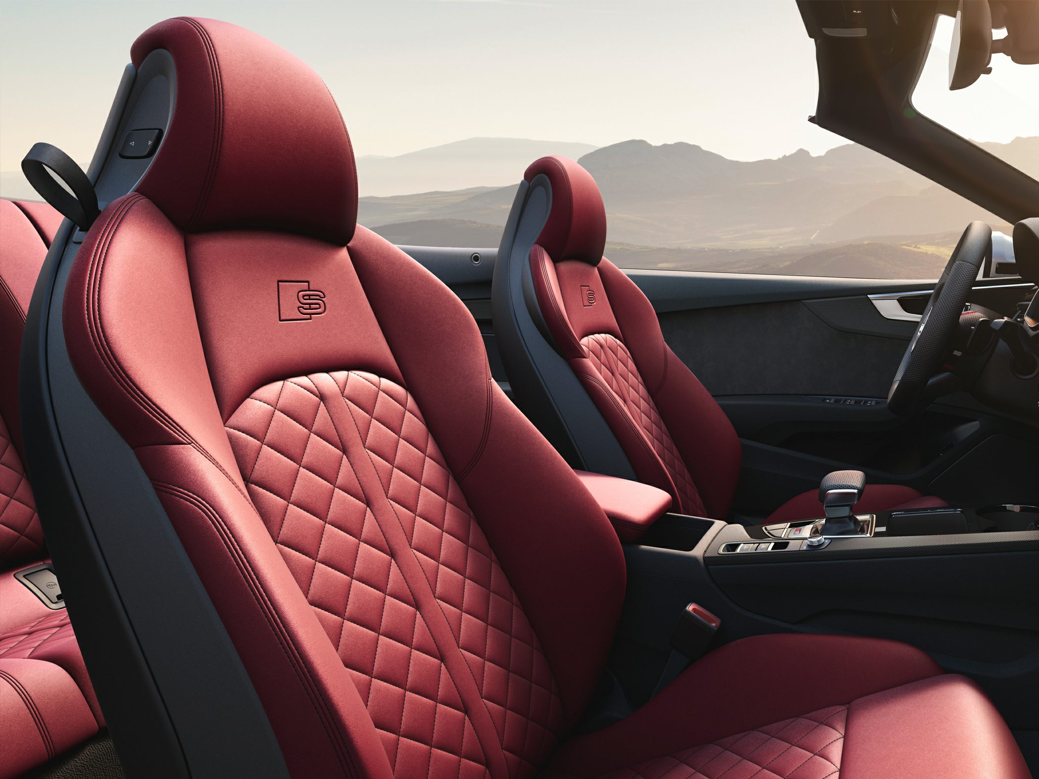 Red quilted leather sport seats with embossed 'S' logo
