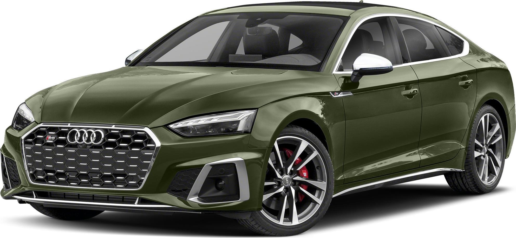 Front three-quarter view of sporty sedan with LED headlights and honeycomb grille