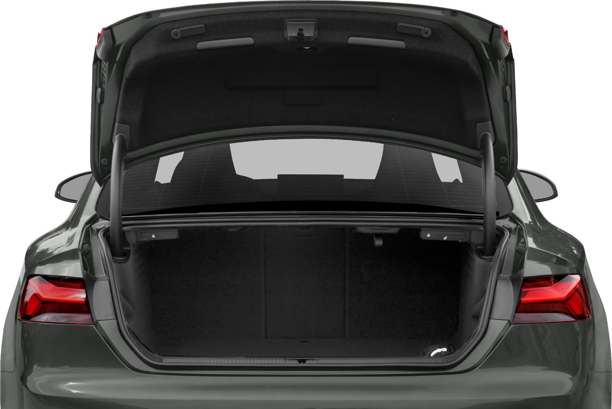 Open rear trunk with spacious cargo area and modern taillights.