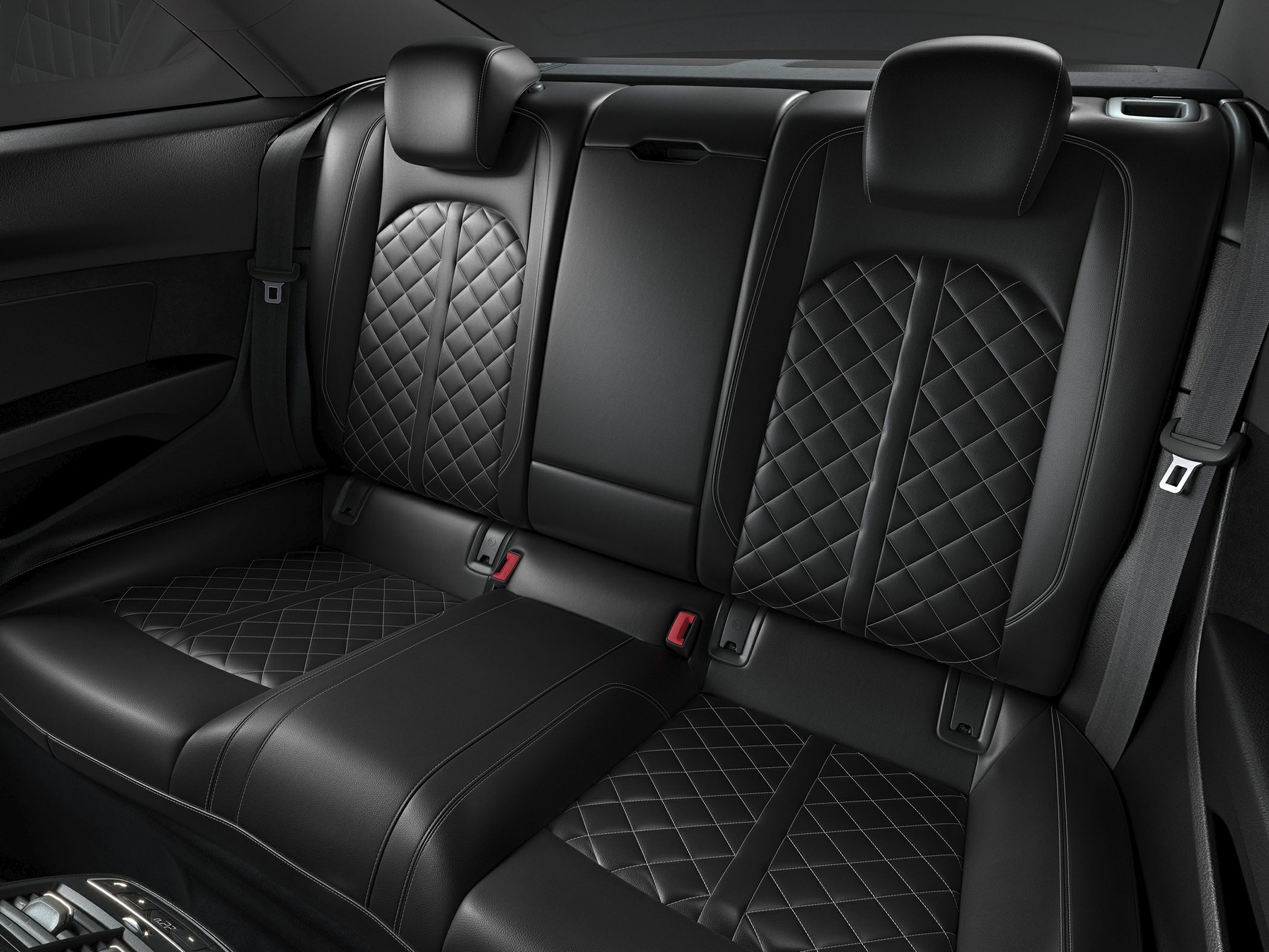 Diamond-stitched black leather rear seats with headrests and seat belts