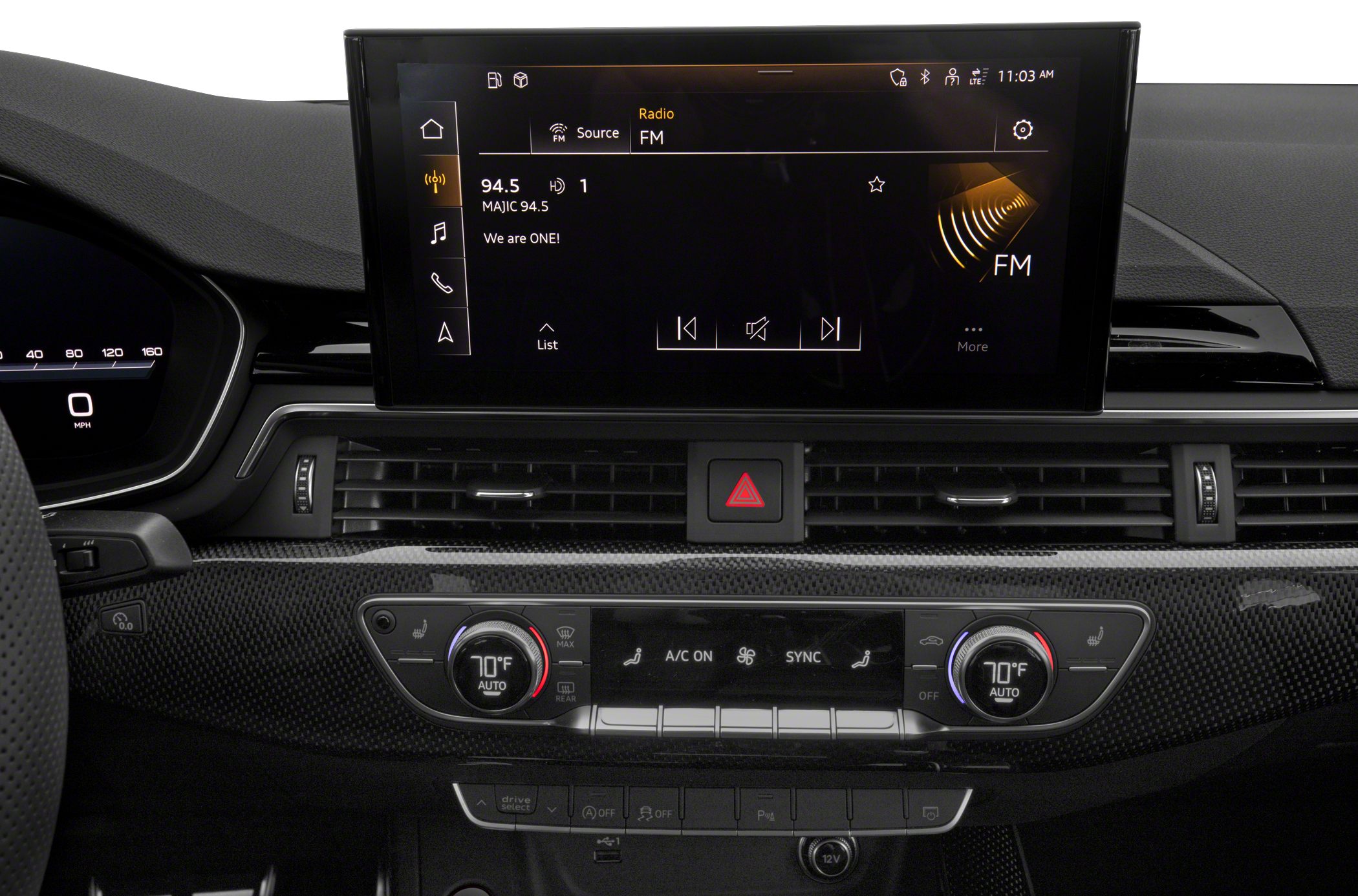 Infotainment display and dual-zone climate control system in luxury coupe interior