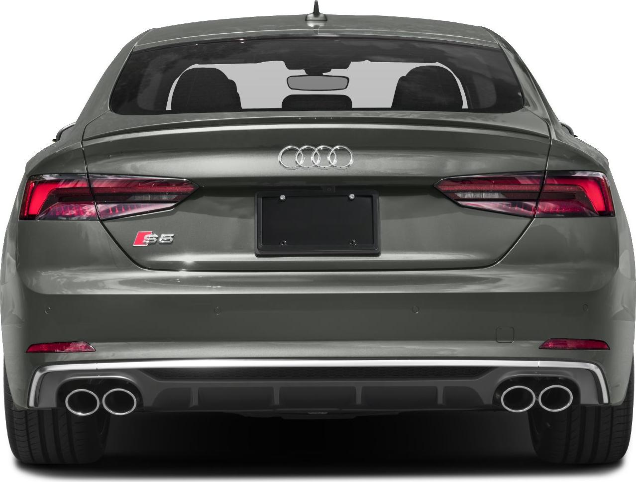 Rear view with quad exhausts, LED taillights, and Audi emblem