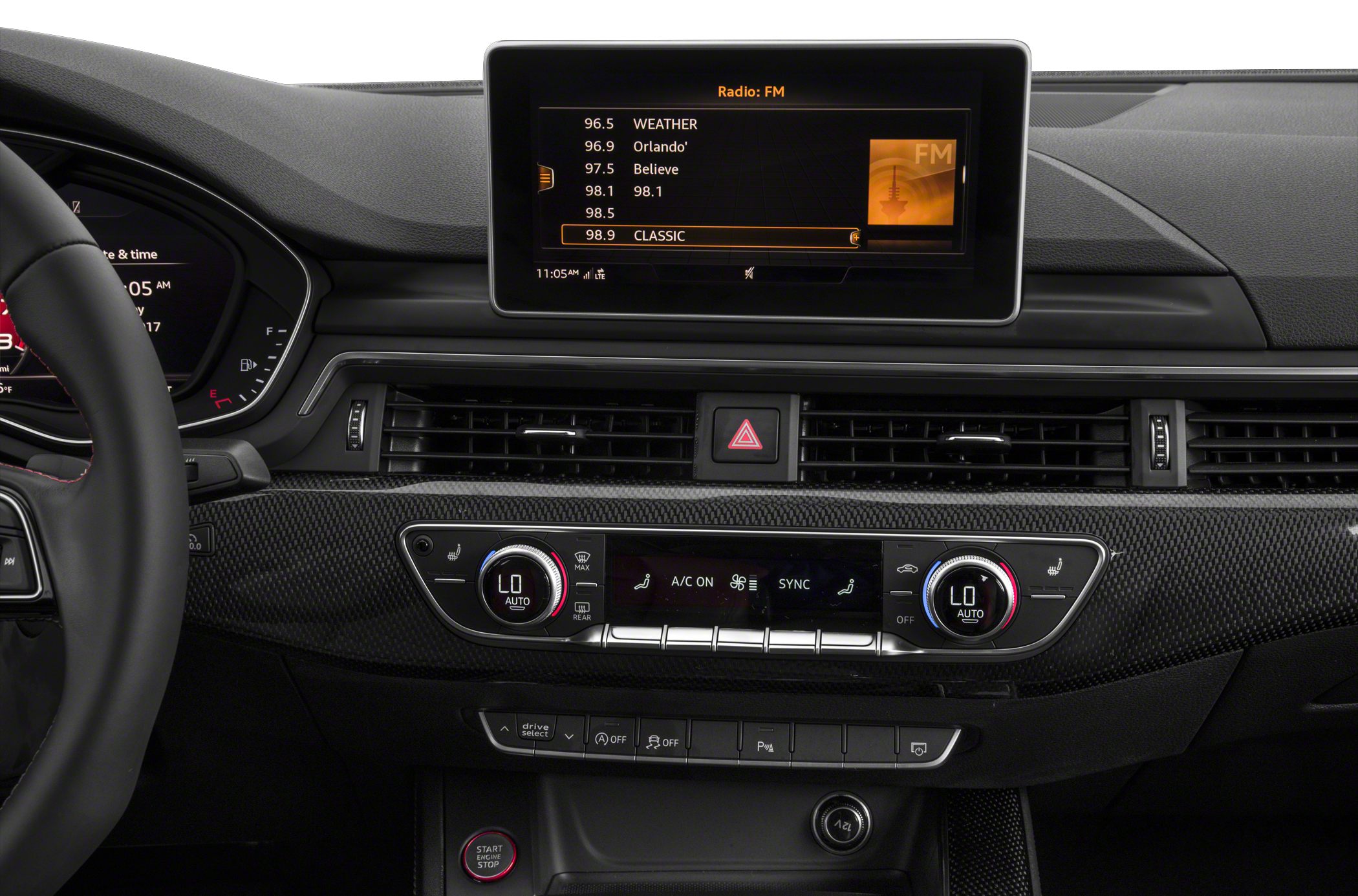 Close-up of a car's infotainment screen and dual-zone climate control panel.