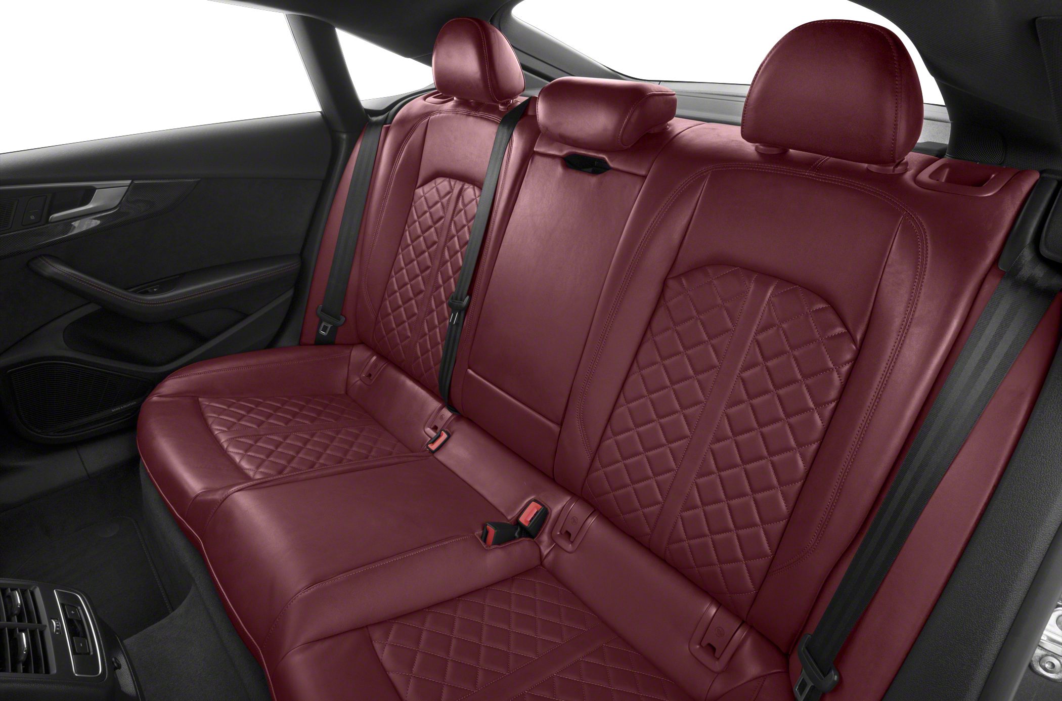 Quilted red leather rear seats with headrests and seat belts