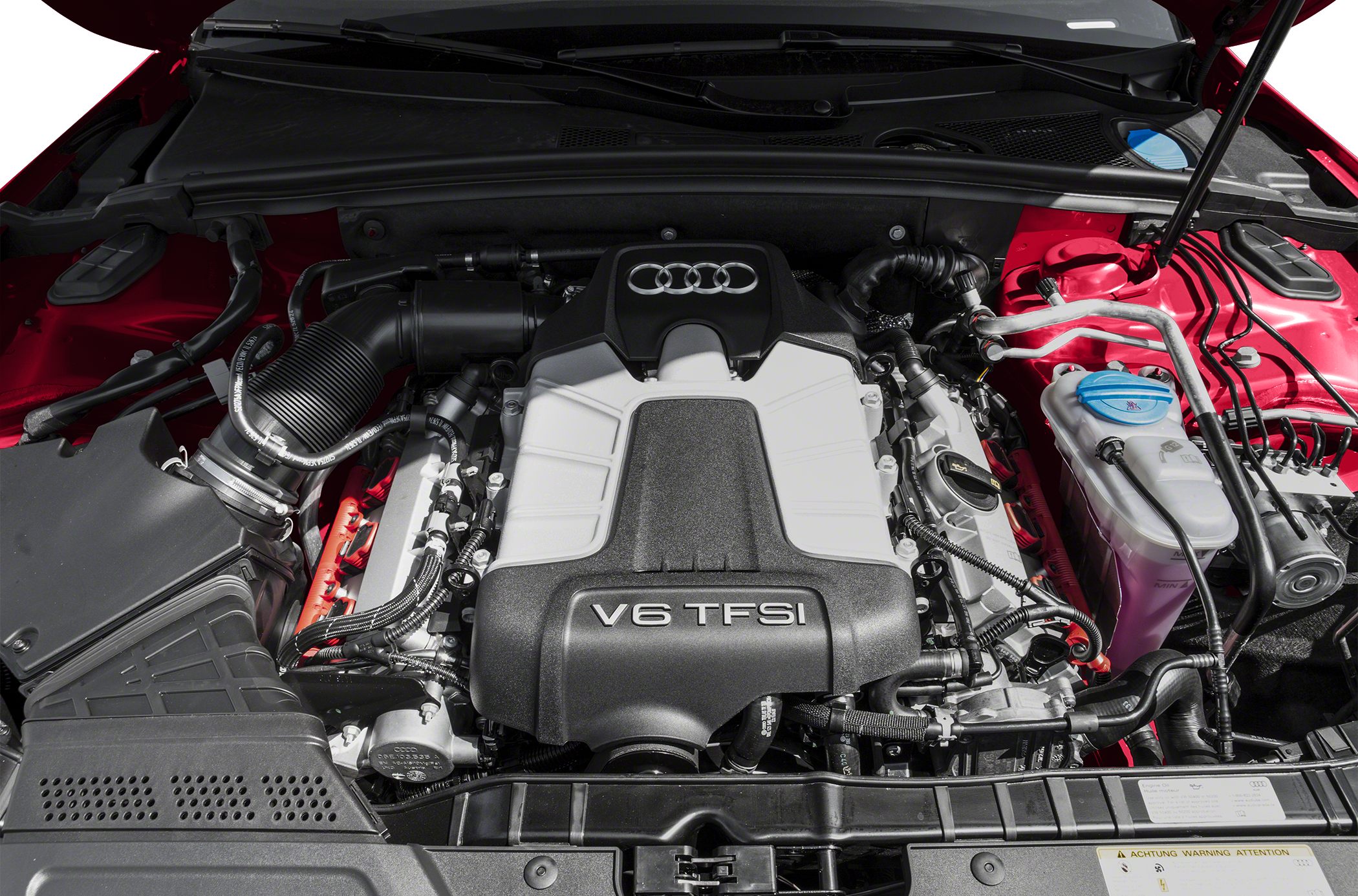 Close-up of a V6 TFSI engine with visible intake and cooling system