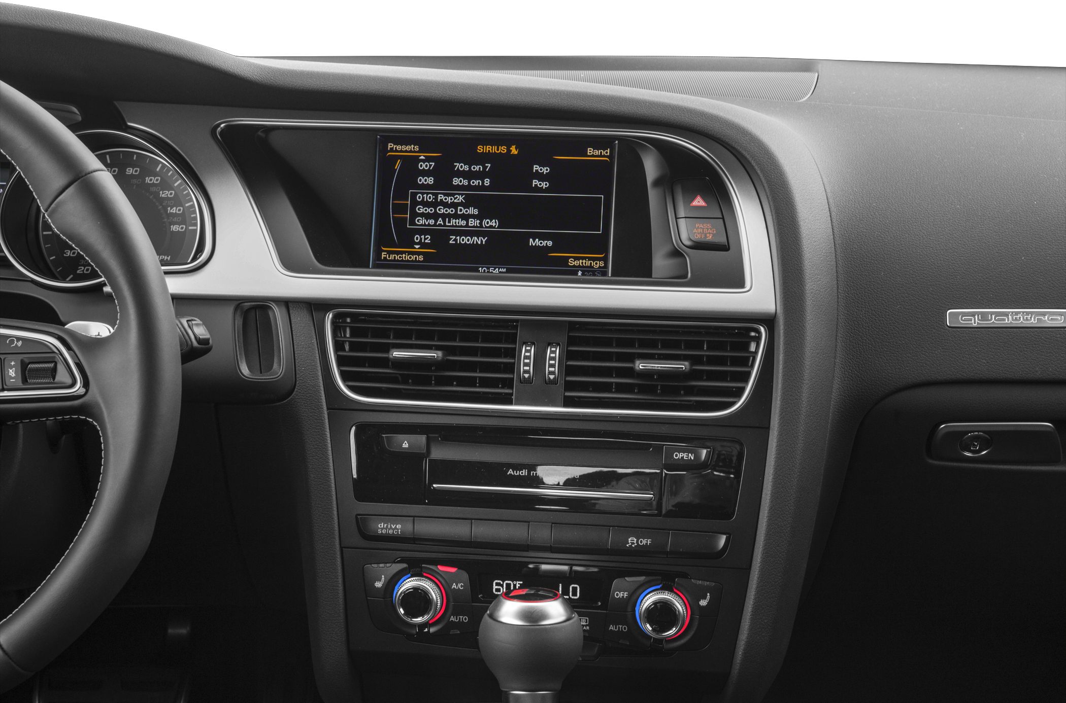 Audi interior with central infotainment, climate controls, and dashboard display