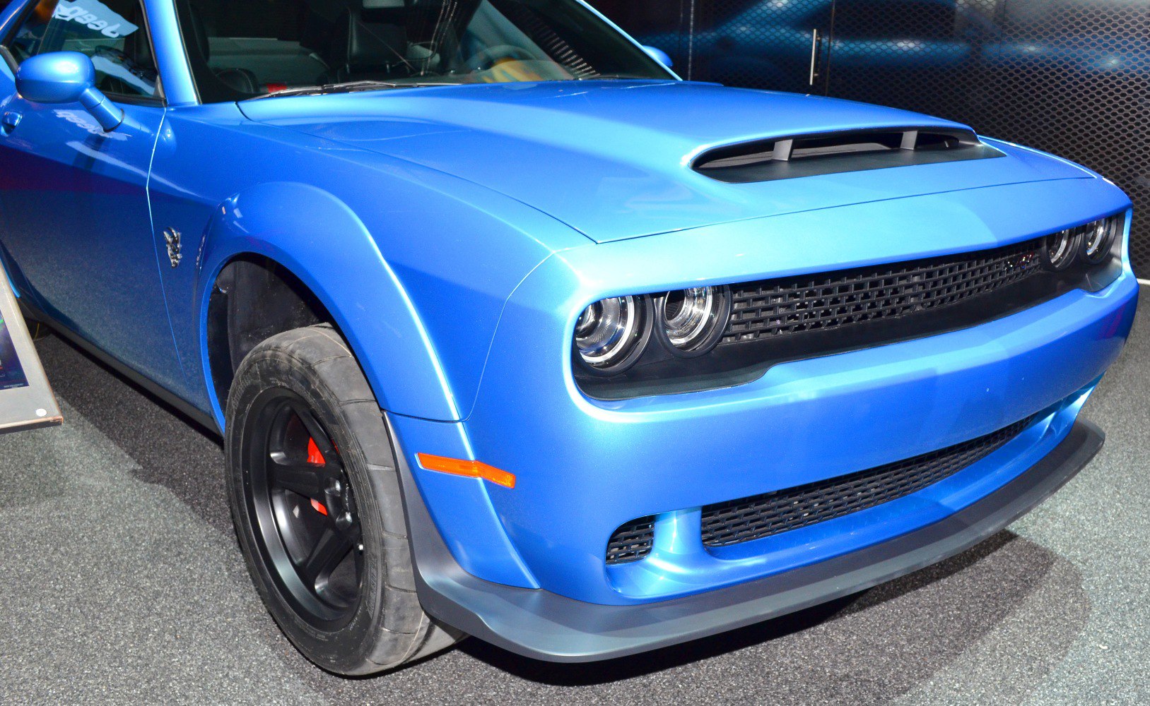 Front end with hood scoop and dual headlights