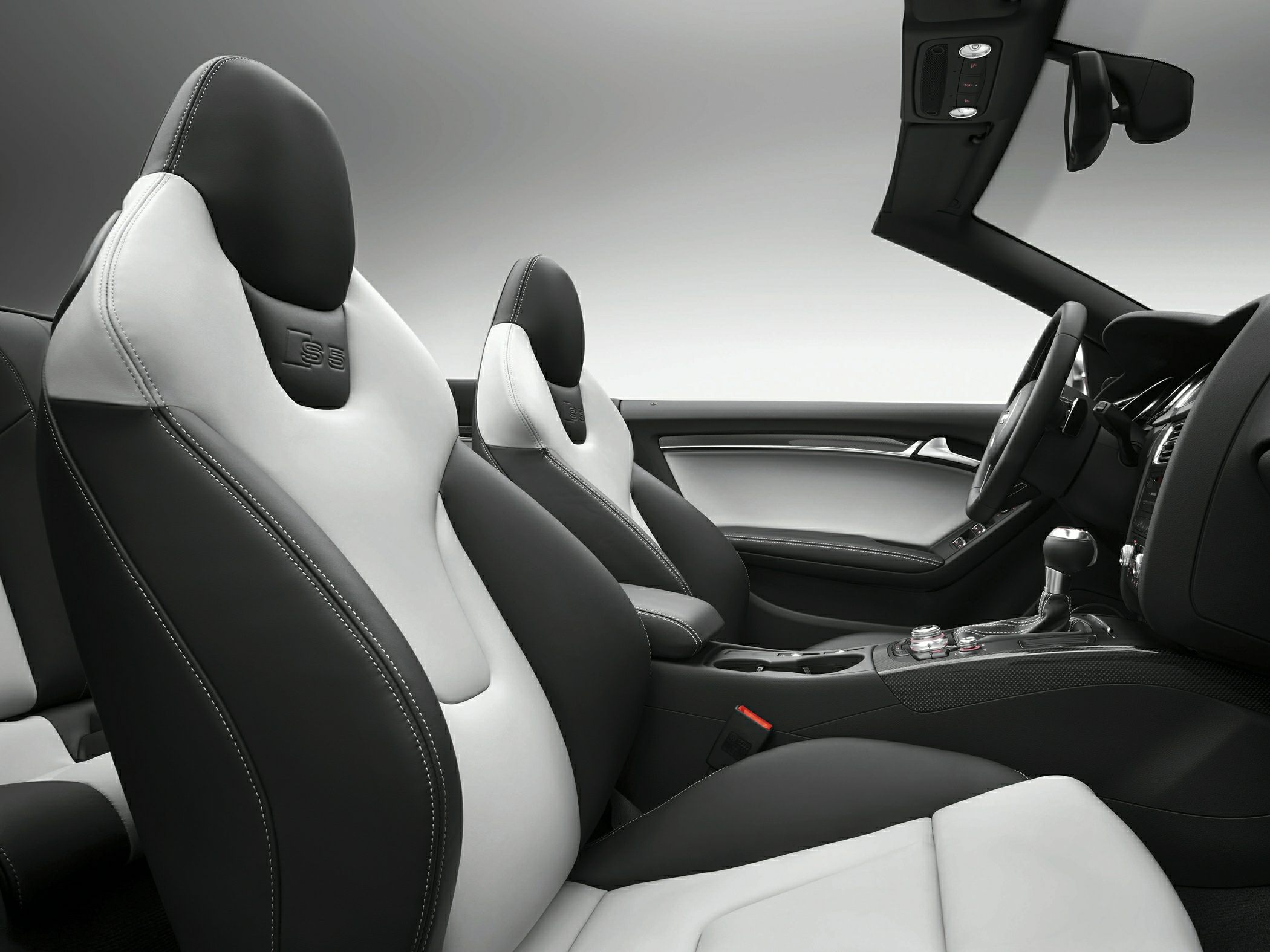 Dual-tone leather sports seats and modern dashboard interior
