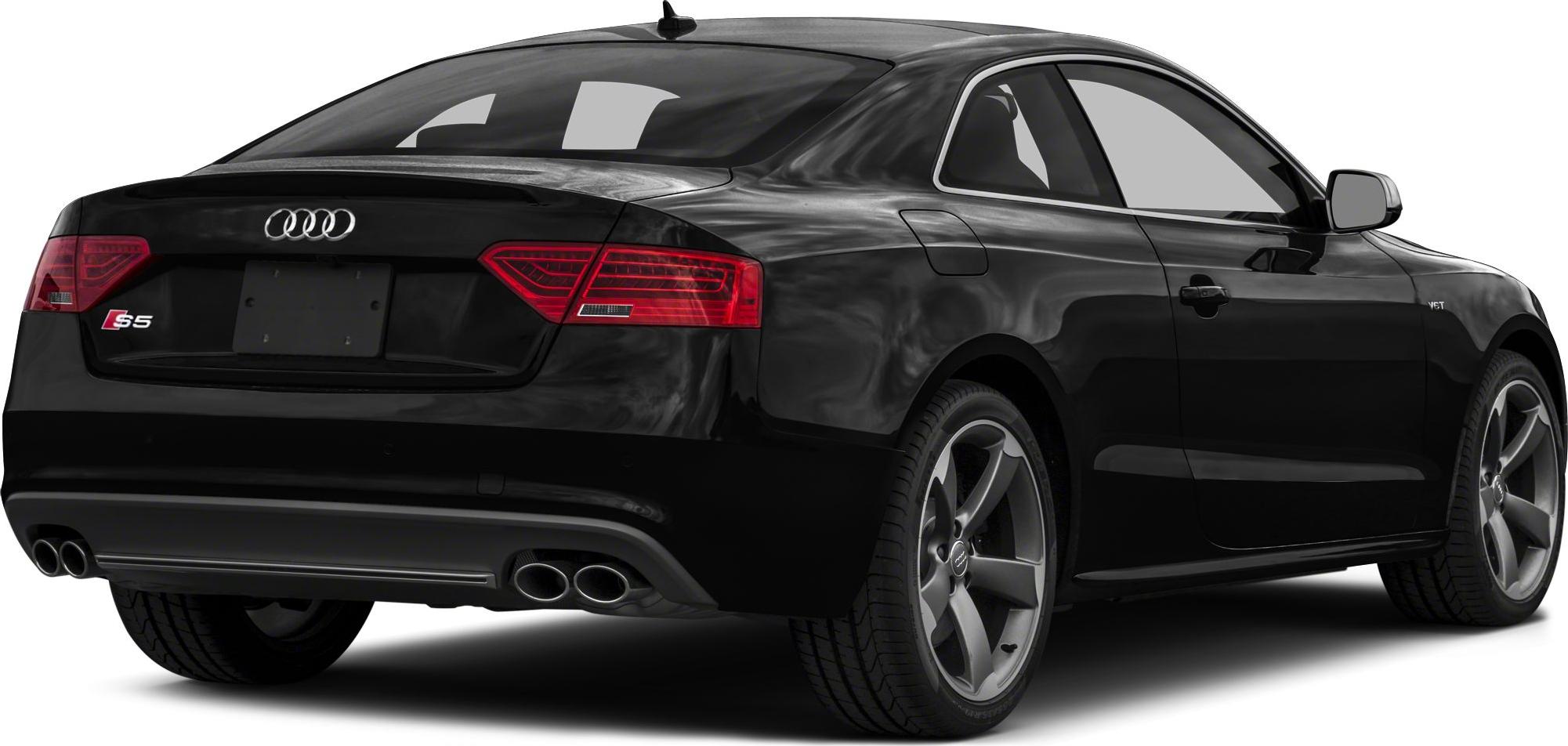 Rear and side view of sporty black coupe with dual exhausts and distinctive taillights