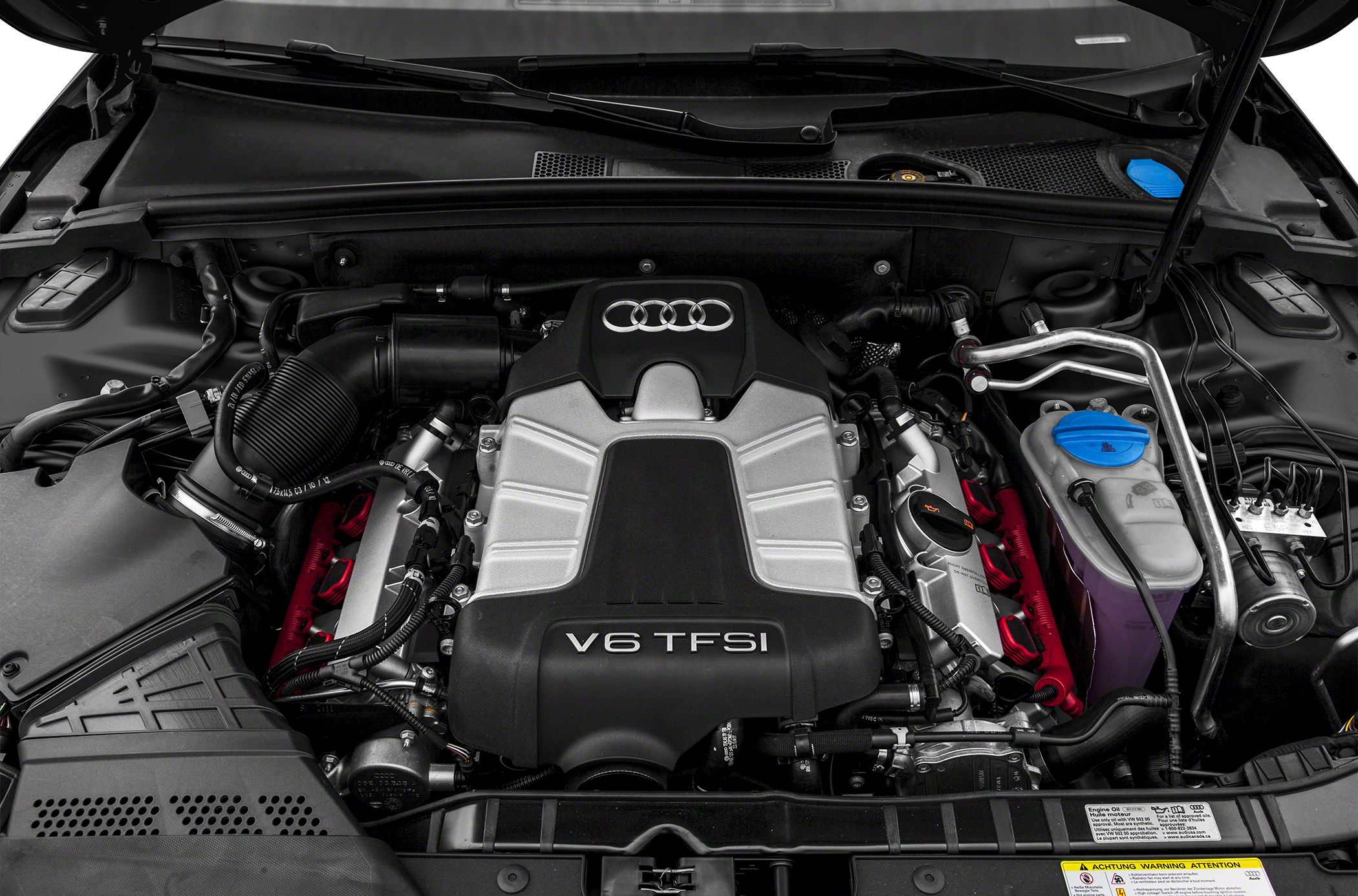 V6 TFSI engine with Audi rings emblem and detailed engine bay components