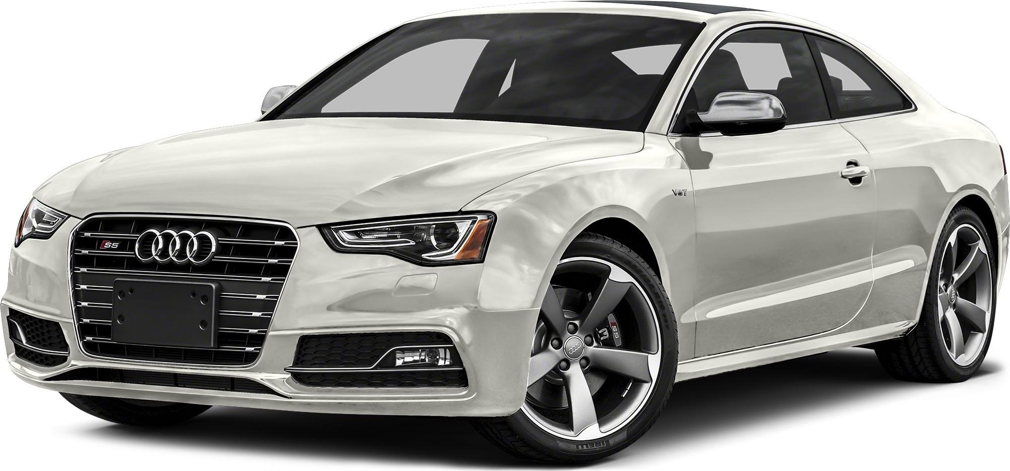 White coupe with prominent grille and alloy wheels