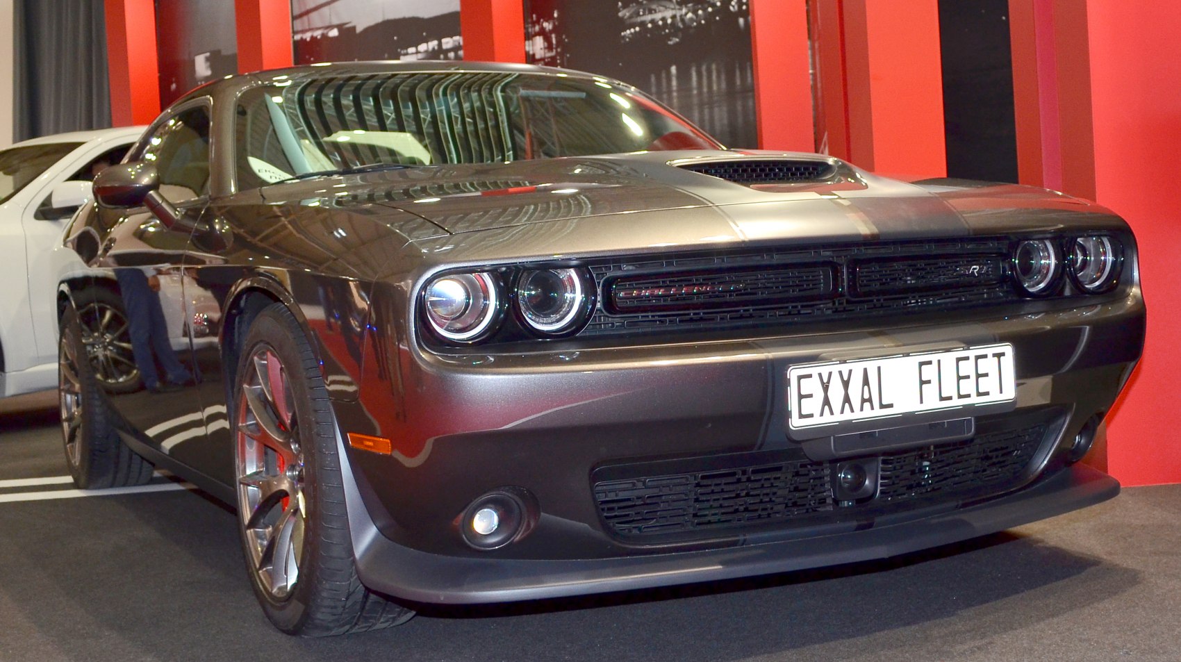 Aggressive front fascia with dual round headlights and hood scoop