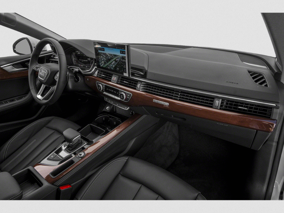 Interior with wood trim, digital navigation display, and modern dashboard layout.