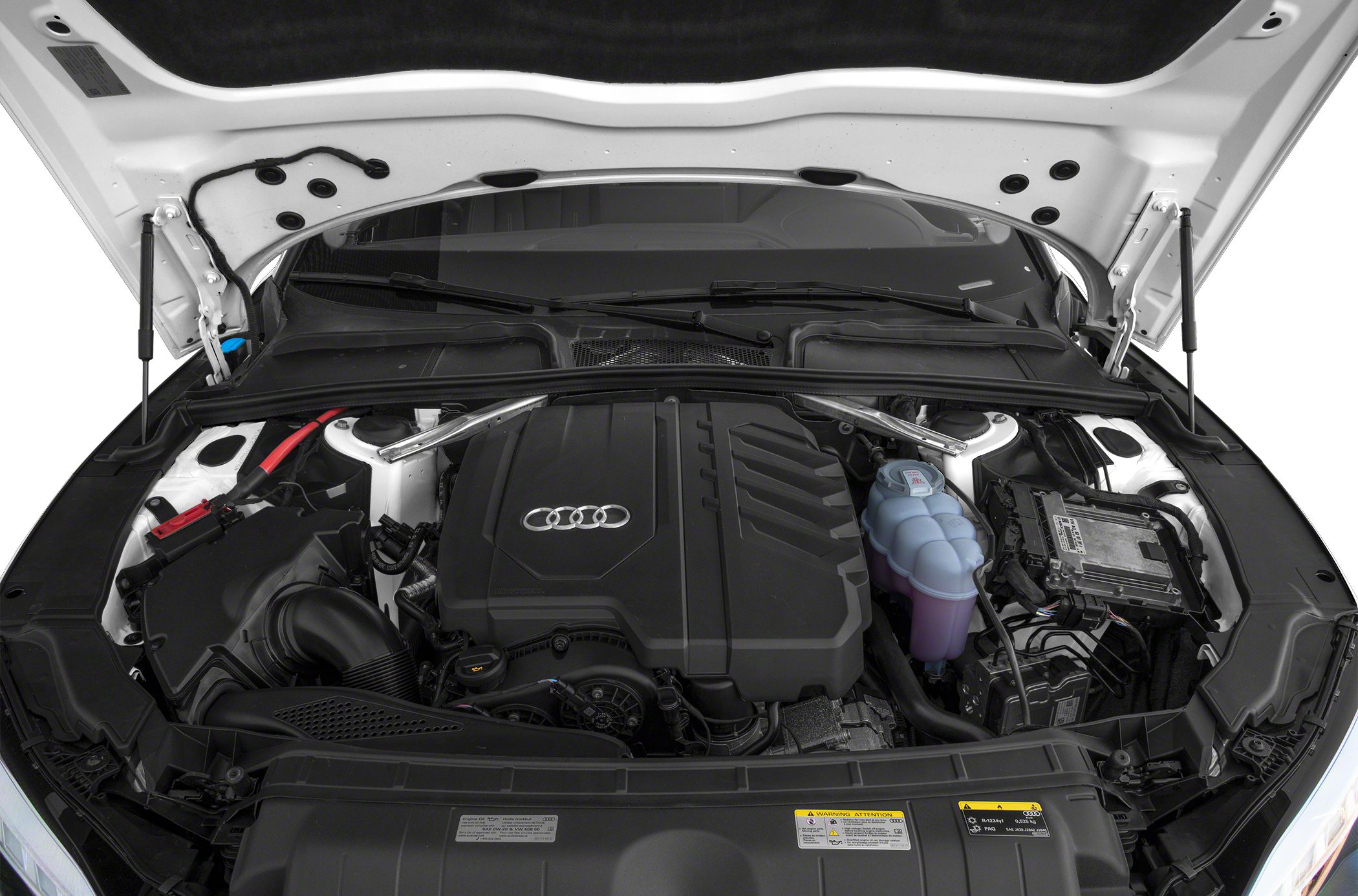 Engine bay with engine cover and coolant reservoir