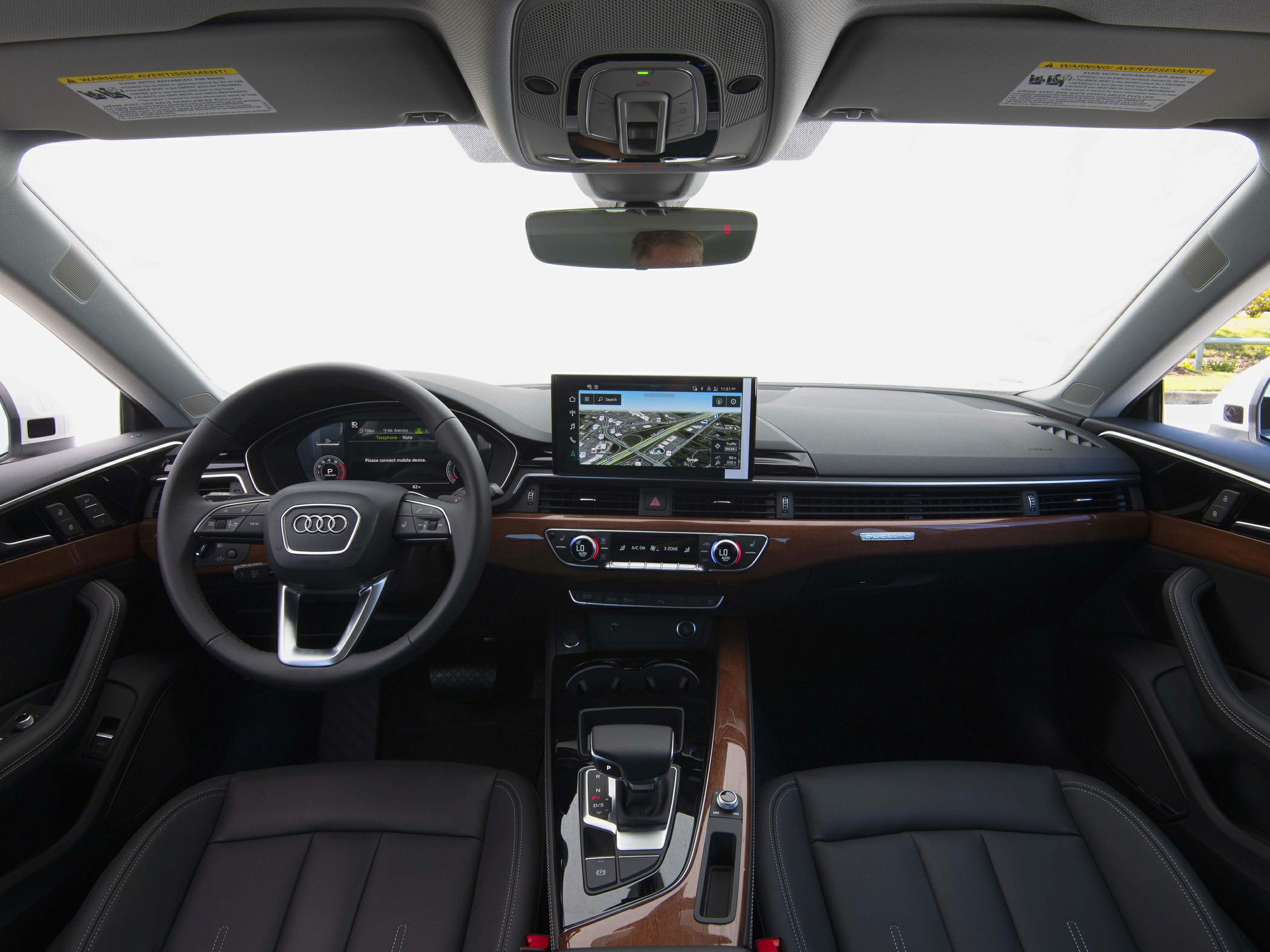 Dashboard with digital display, premium wood trim, steering wheel controls