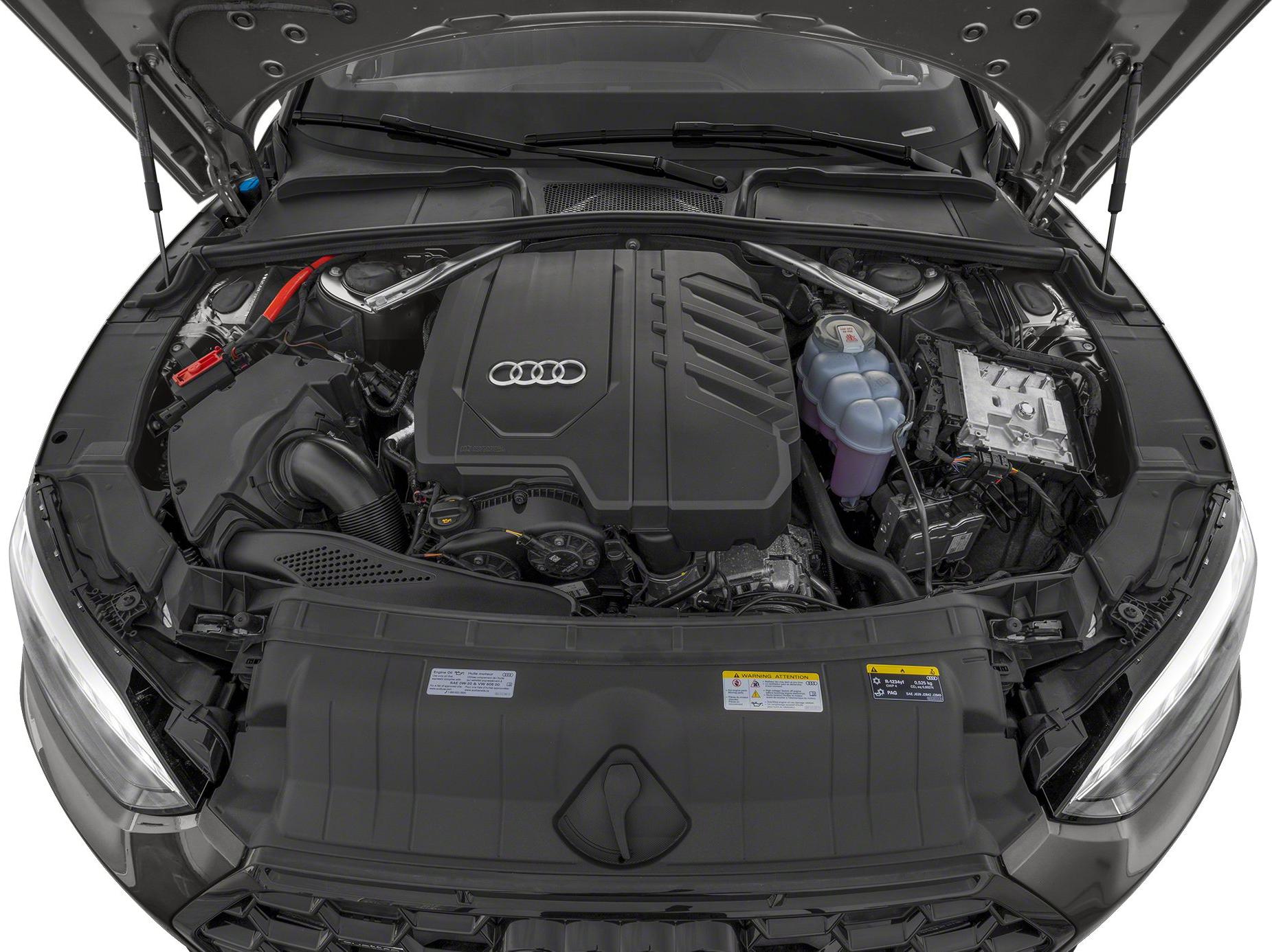 Modern engine bay with covered engine and visible coolant reservoir