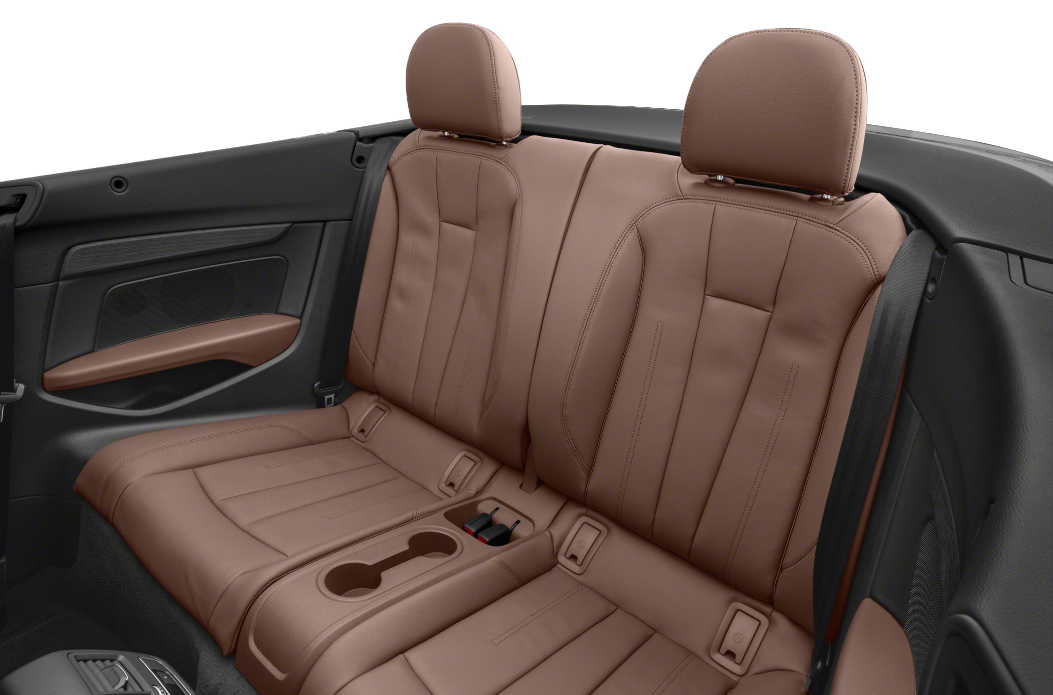 Rear seat interior with brown leather upholstery and cup holders