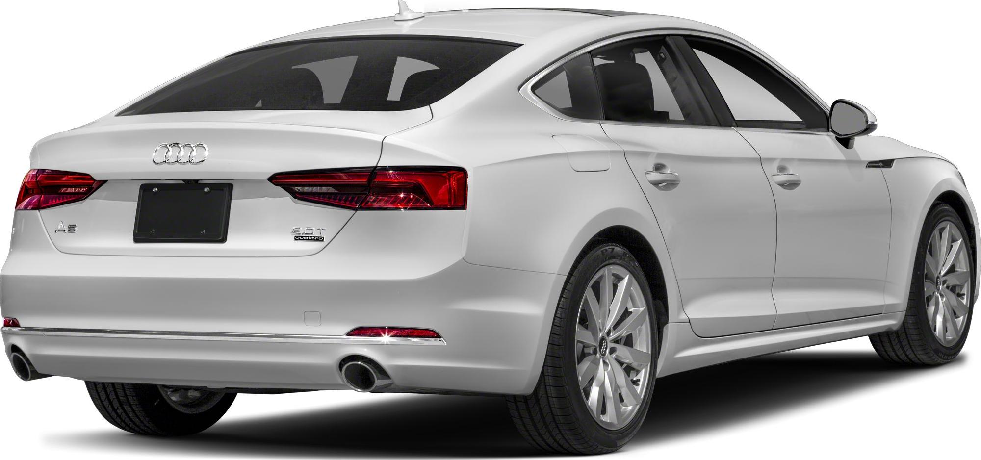 White rear sedan with LED tail lights and dual exhausts
