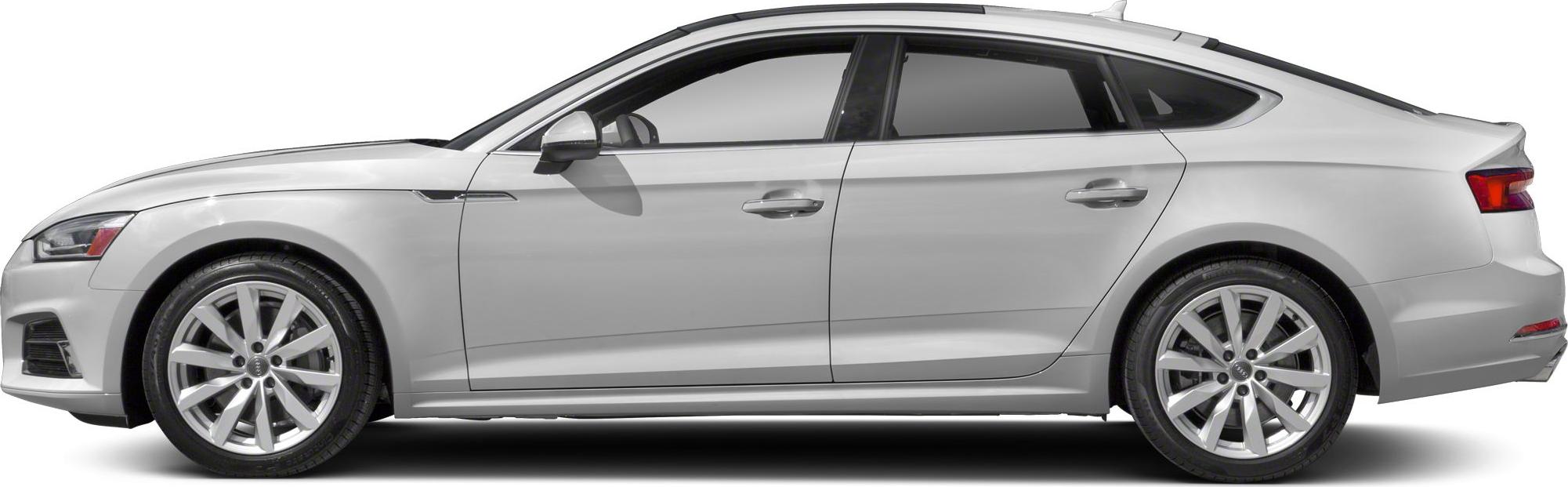 Side profile of silver mid-size sedan with alloy wheels and tinted windows