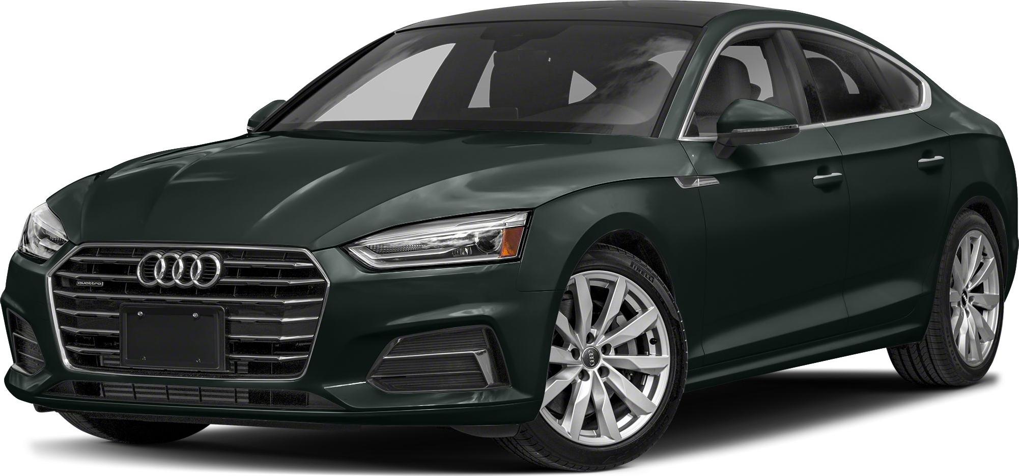 Front grille and alloy wheels of a modern 4-door sedan